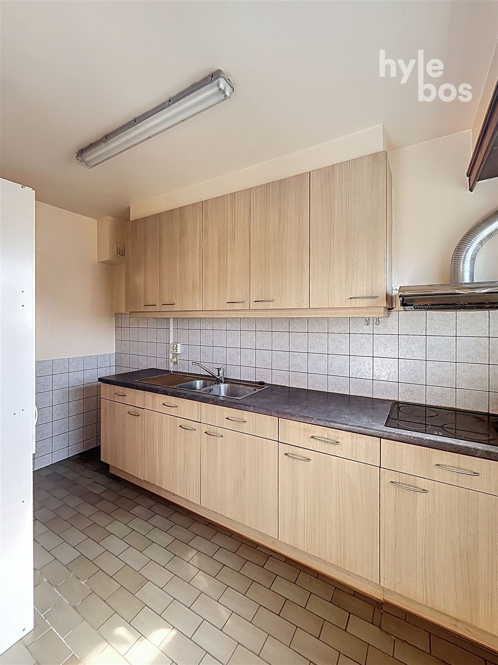 Gelijkvloers 2 slaapkamer appartement met tuin en garage foto 4