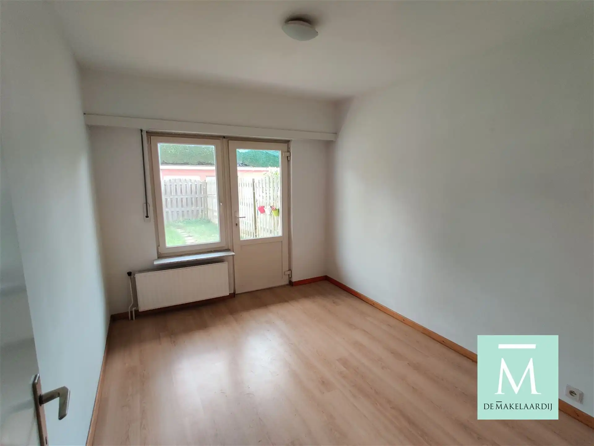 Centraal gelegen gelijkvloersappartement met 2 slaapkamers en tuin! foto 5