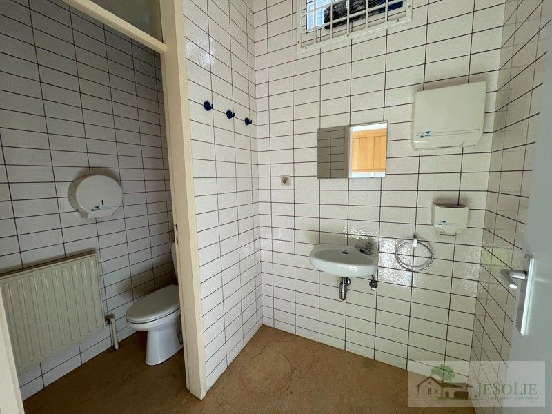 Handelspand + ruim appartement  met potentieel foto 35