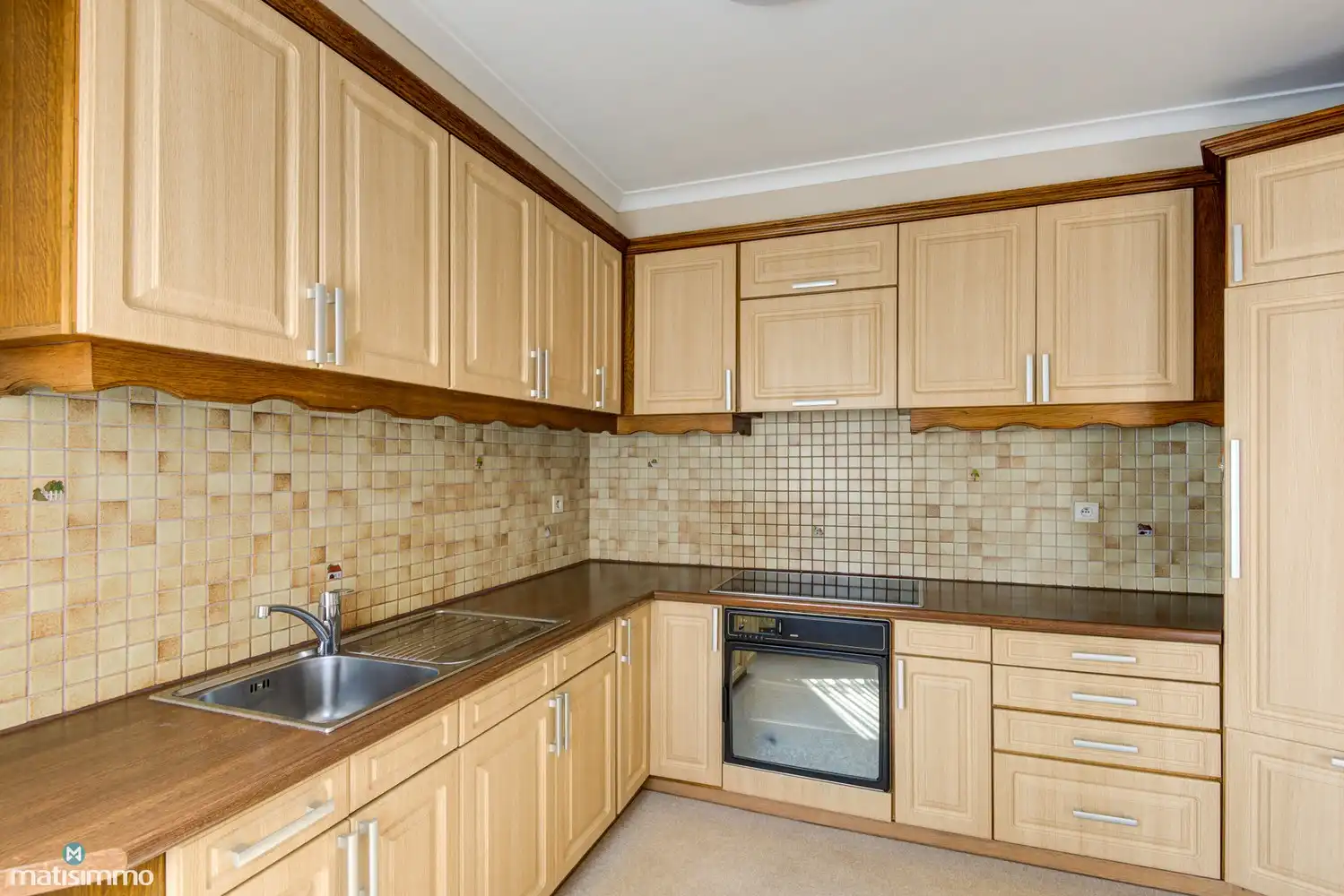 RUIM APPARTEMENT MET 3 SLAAPKAMERS, BALKON, KELDERBERGING EN GARAGEBOX IN BEVERST foto 7