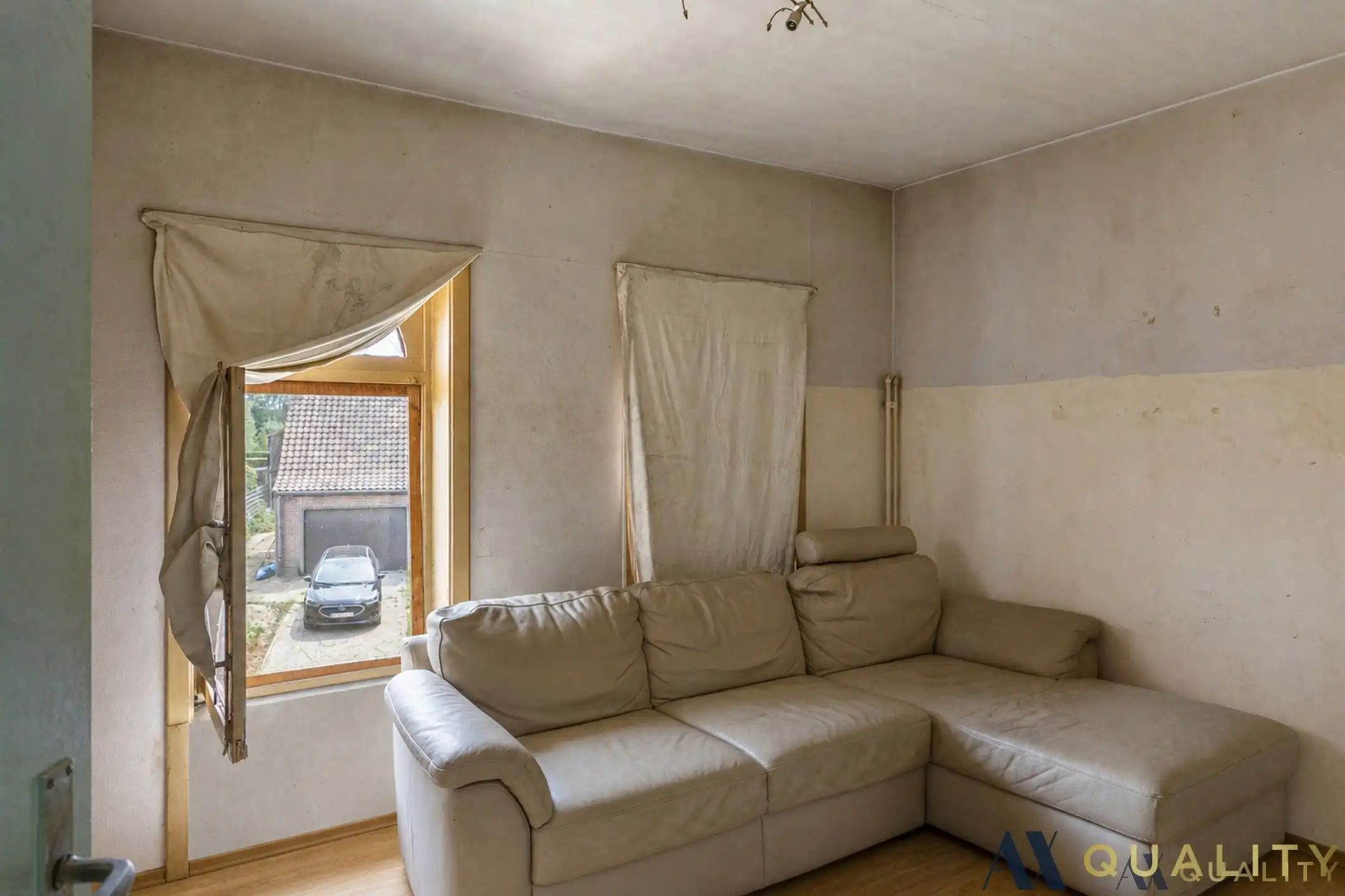 Te renoveren gesloten bebouwing met garage, ruime tuin en groenzicht in Oppuurs foto 9