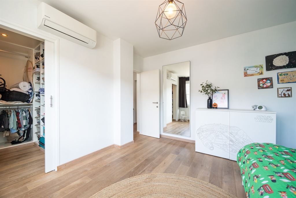 Instapklare woning met garage en gezellige tuin foto 18