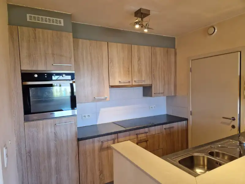 Gezellig appartement met twee slaapkamers, garage en groot terras foto 6