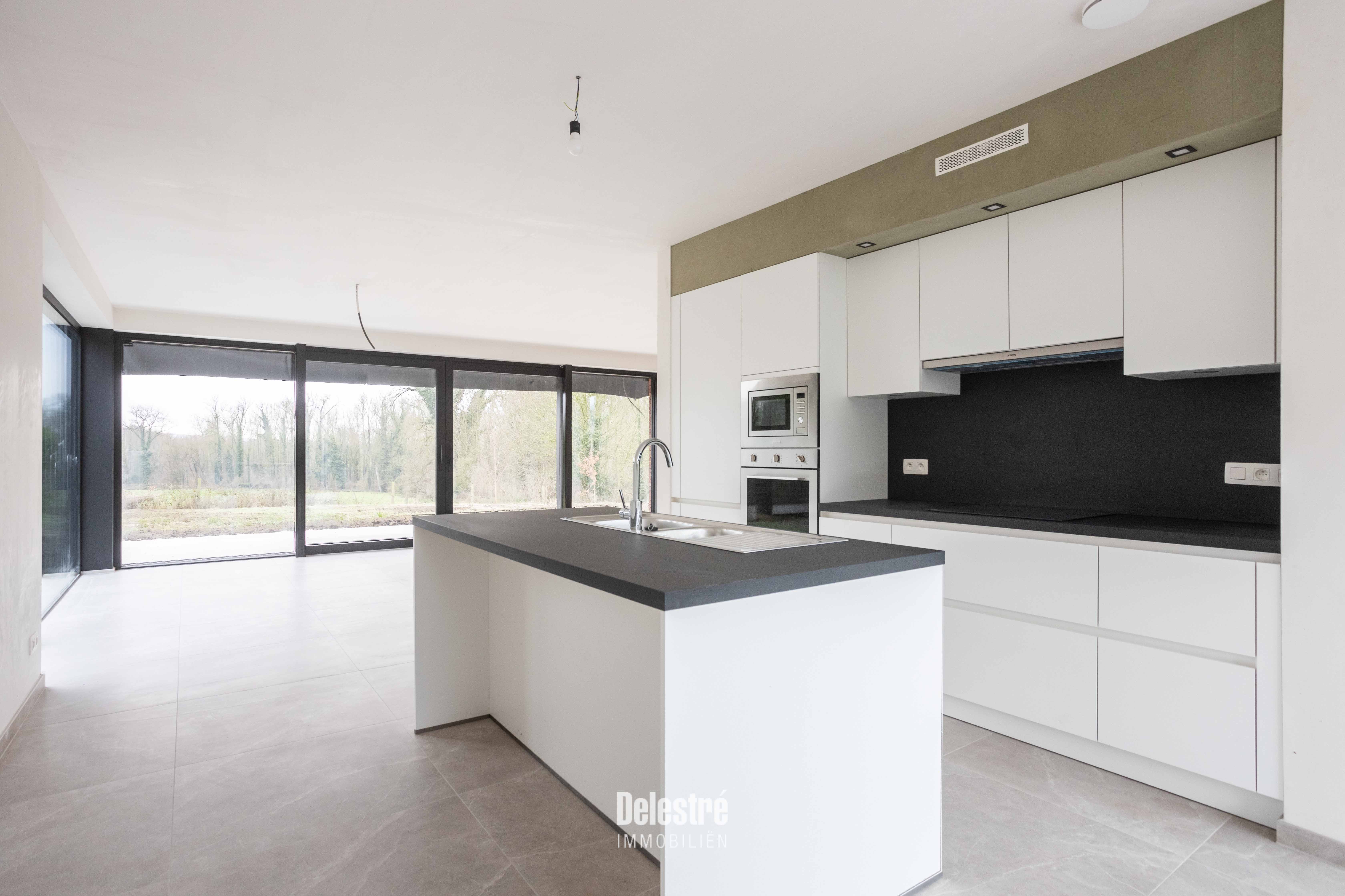 NIEUWBOUW OPEN BEBOUWING MET ZALIGE TUIN foto 7
