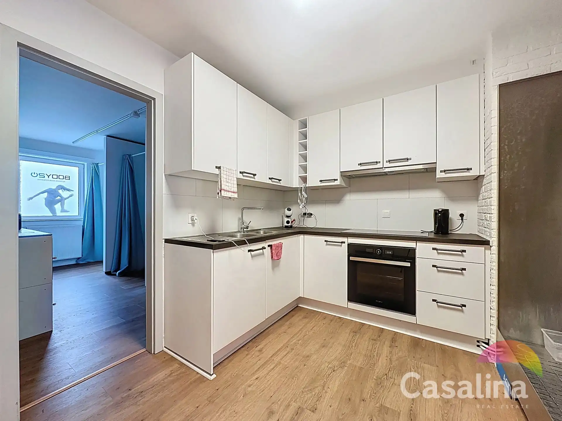 Gemengd gebouw bestaande uit 2 handelsruimtes en 4 woonunits foto 5