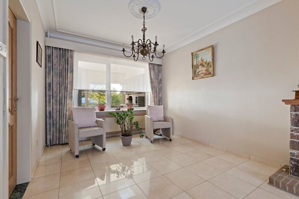 CHARMANTE, INSTAPKLARE WONING MET 3 SLAAPKAMERS, GROTE ZOLDER EN GEEZELLIGE BUITENRUIMTE foto 11