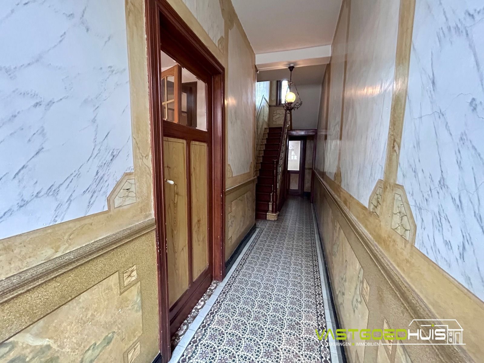 Karaktervolle gezinswoning met authentieke details in Ninove foto 4