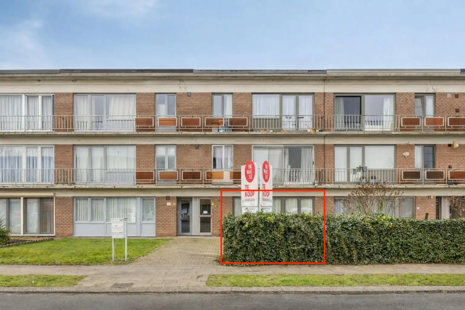 Gelijkvloers appartement met ZW-tuin en garage te koop foto 17