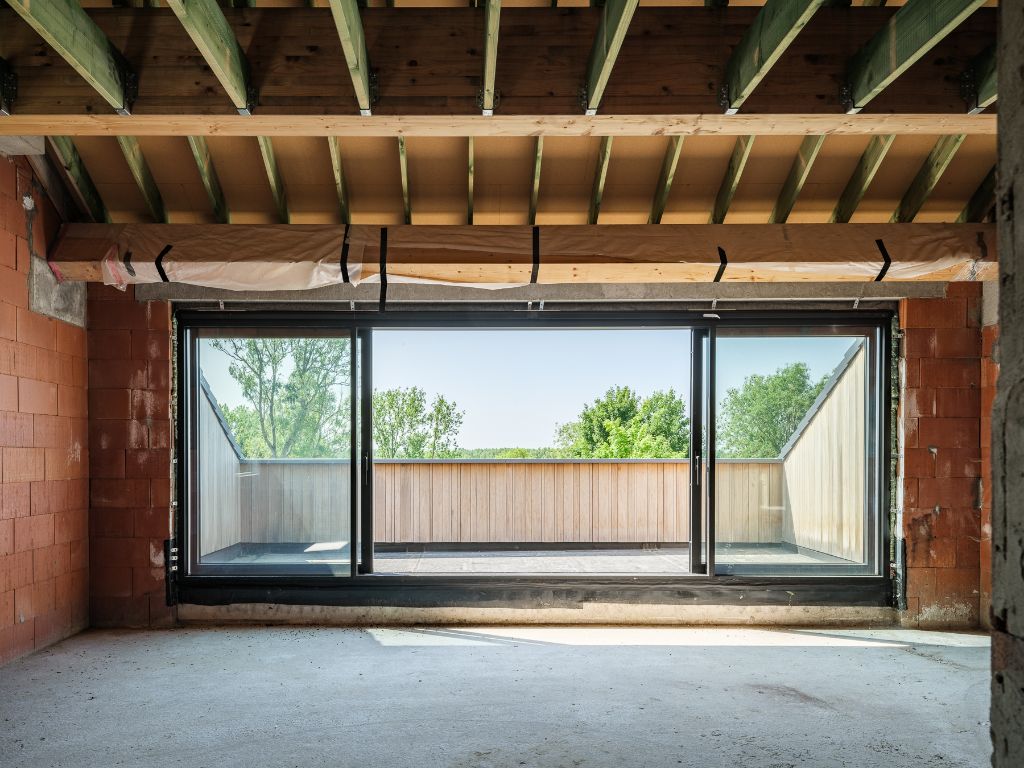 Architecturale casco-nieuwbouw bestaande uit een uitzonderlijke stapelwoning met onderliggende garage en adembenemende zichten over de Scheldevallei. foto 16