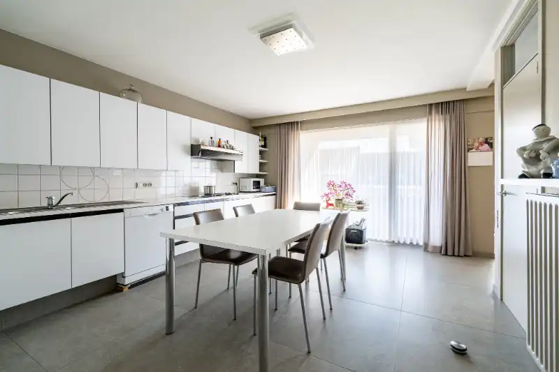 Unieke en ruime woning met geïntegreerd kantoor, 4 slpks en zuidgerichte tuin foto 9