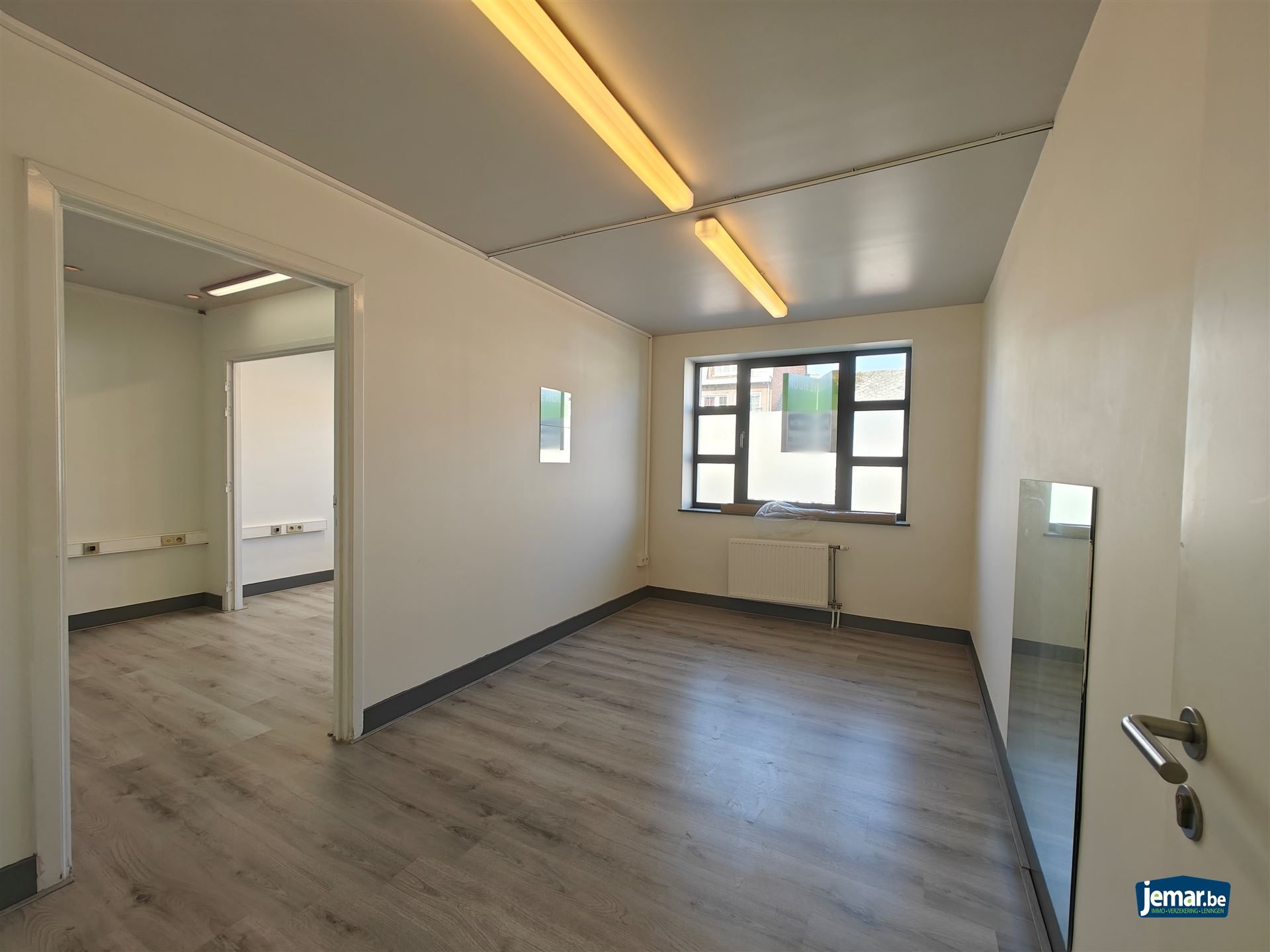 AANDELENOVERDRACHT: Handelspand met appartement foto 20