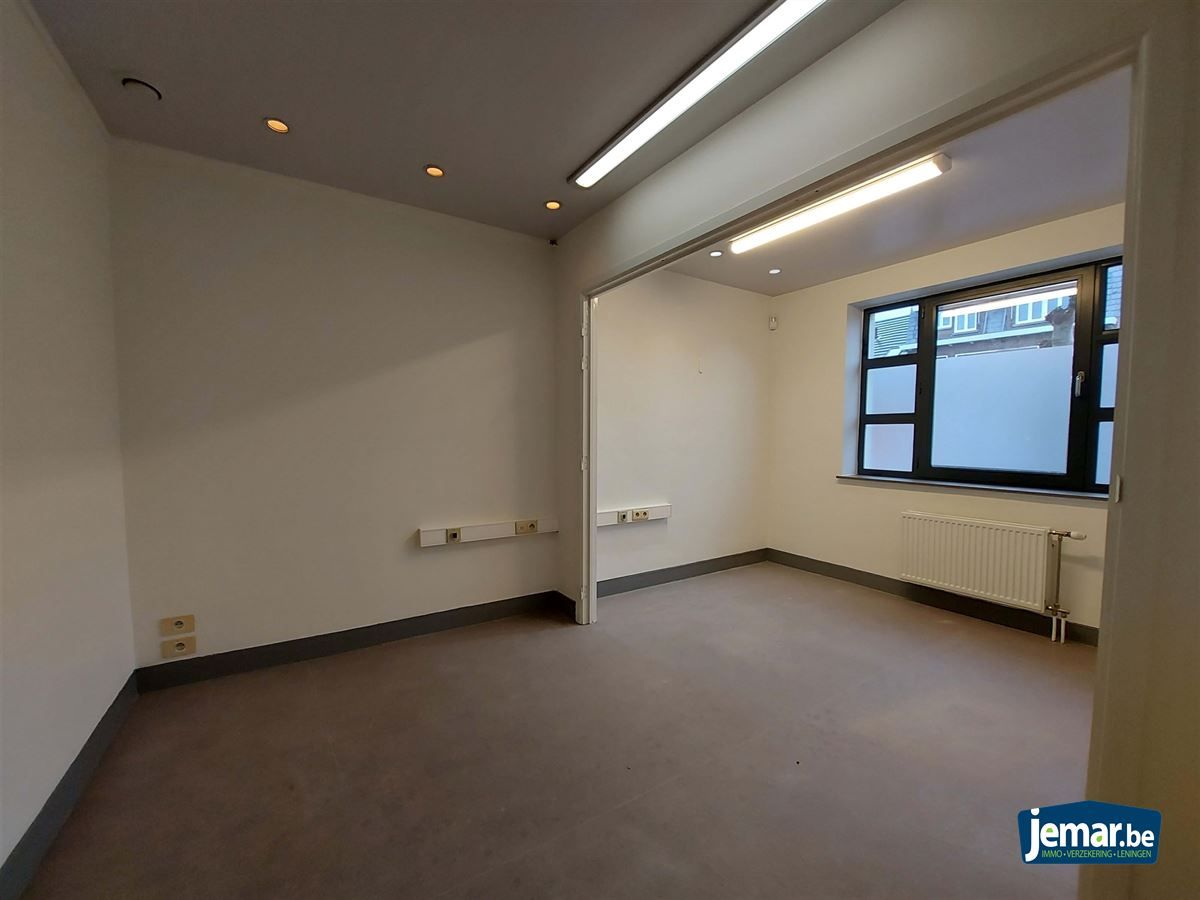 AANDELENOVERDRACHT: Handelspand met appartement foto 20