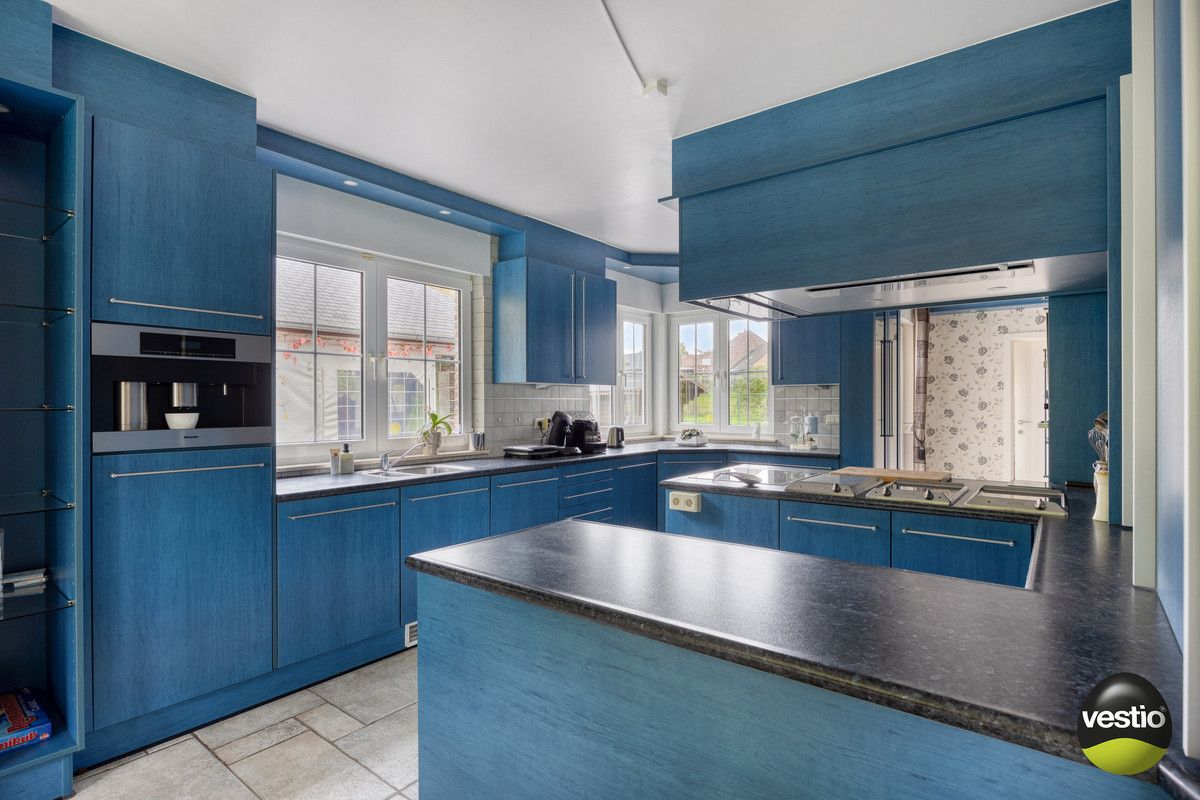 RUSTIG GELEGEN RUIME VILLA MET 5 SLK OP RIANT PERCEEL VAN 18A61CA IN STADSRAND TONGEREN. foto 18