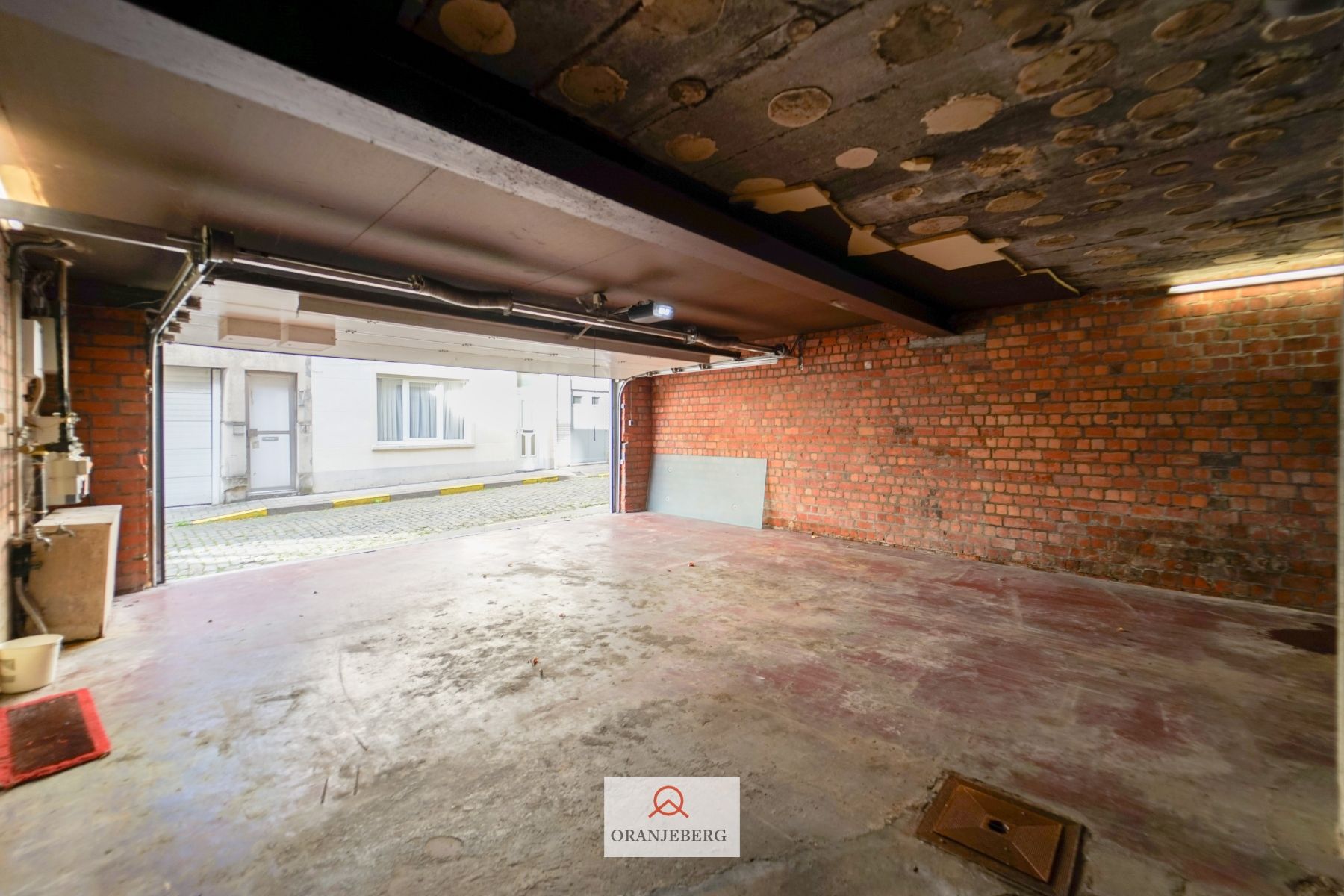 te huur : grote garage voor minimum 2 wagens foto 9