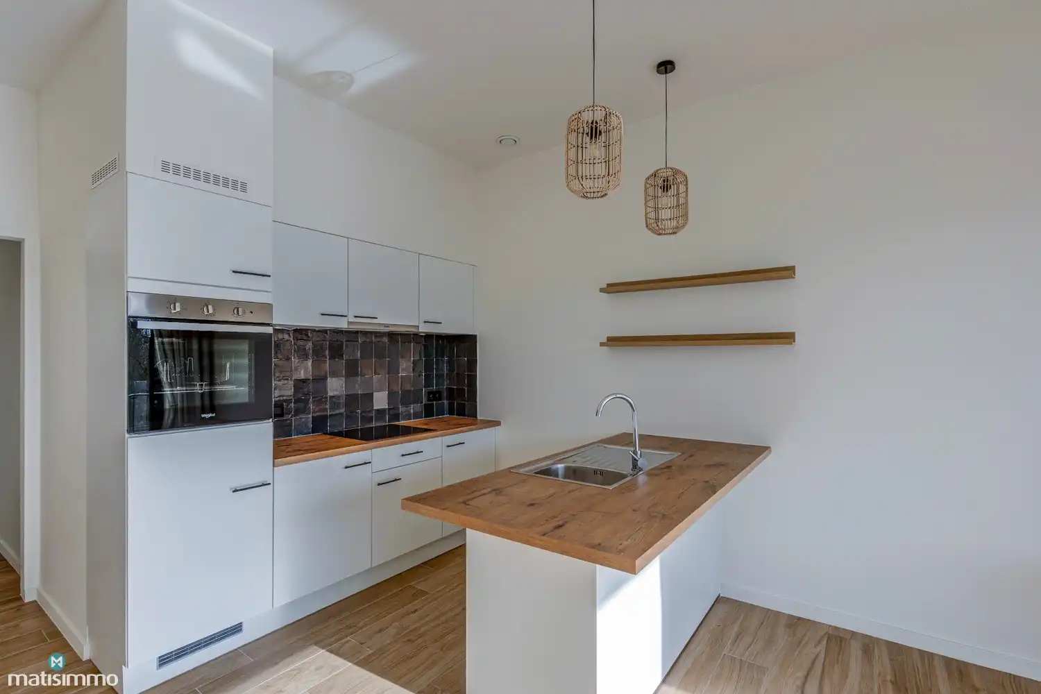 GELIJKSVLOERS APPARTEMENT MET ZUIDGERICHT TERRAS GELEGEN NABIJ HET CENTRUM VAN BILZEN foto 6