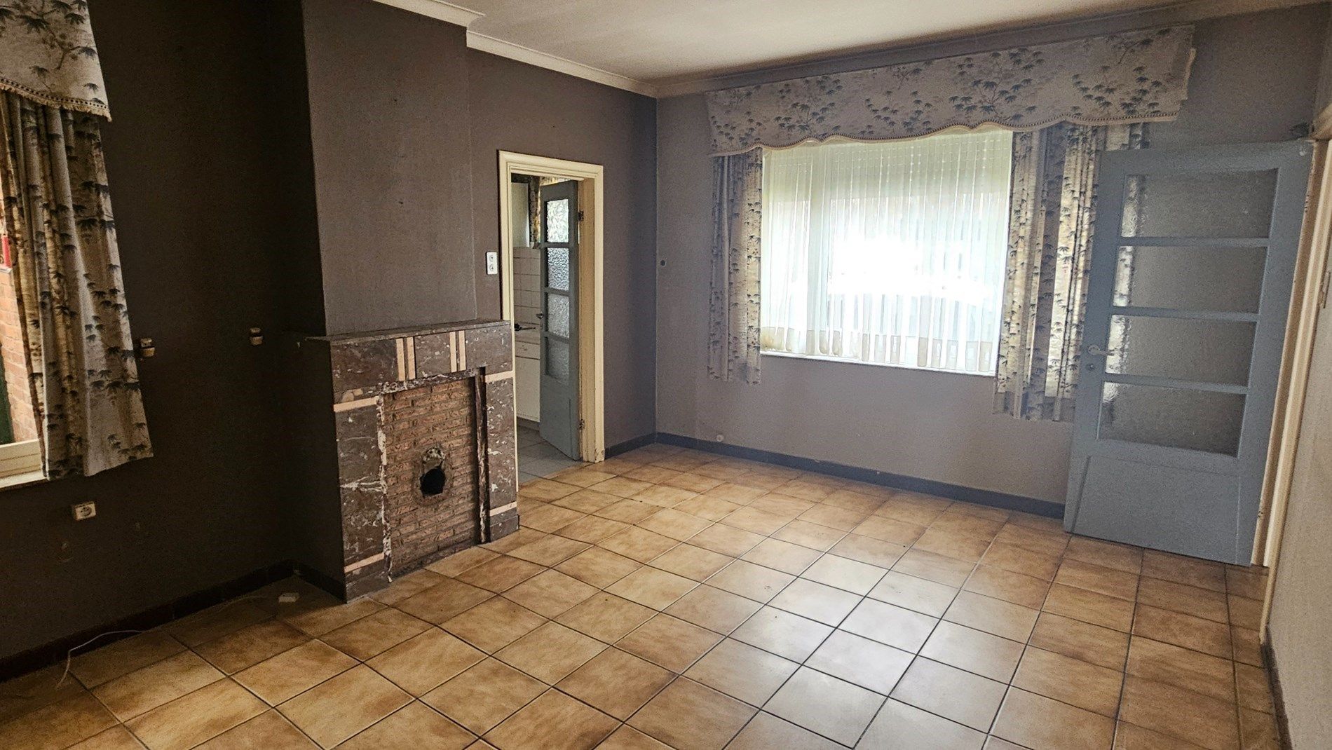 Renovatiewoning met 2 tot 3 slk, garage en koertje aan gunstige prijs foto 9