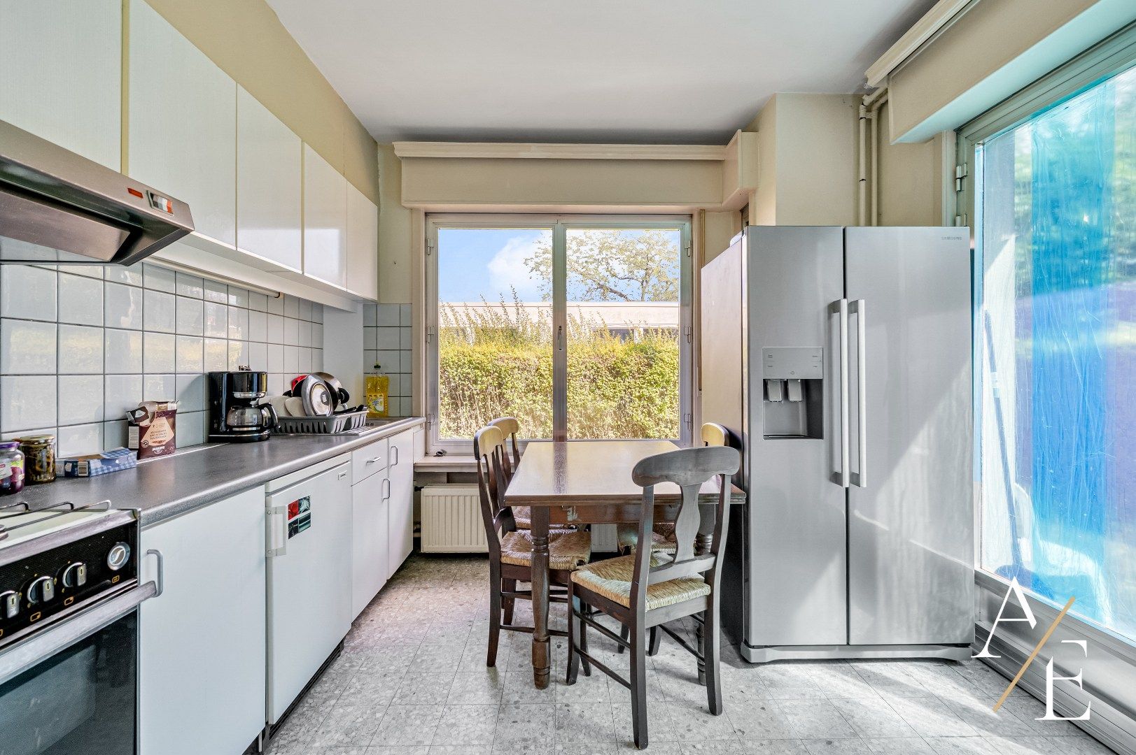 SINT-AMANDSBERG - Te renoveren gelijkvloers appartement (2slk.) met privatieve tuin foto 4