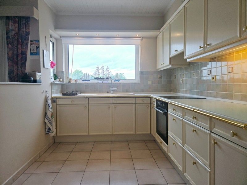 Ruim en instapklaar appartement met ondergrondse autostaanplaats foto 2