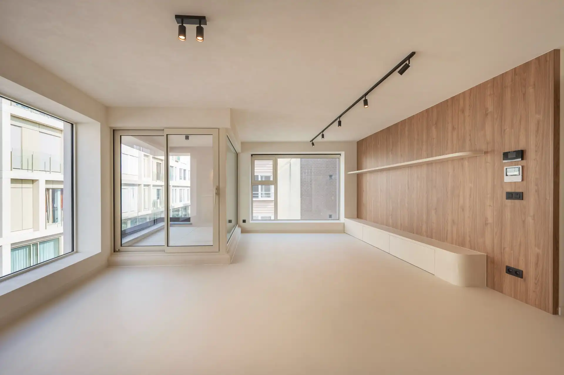 Volledig vernieuwde opbrengsteigendom met drie appartementen en verhuurd handelsgelijkvloers foto 12