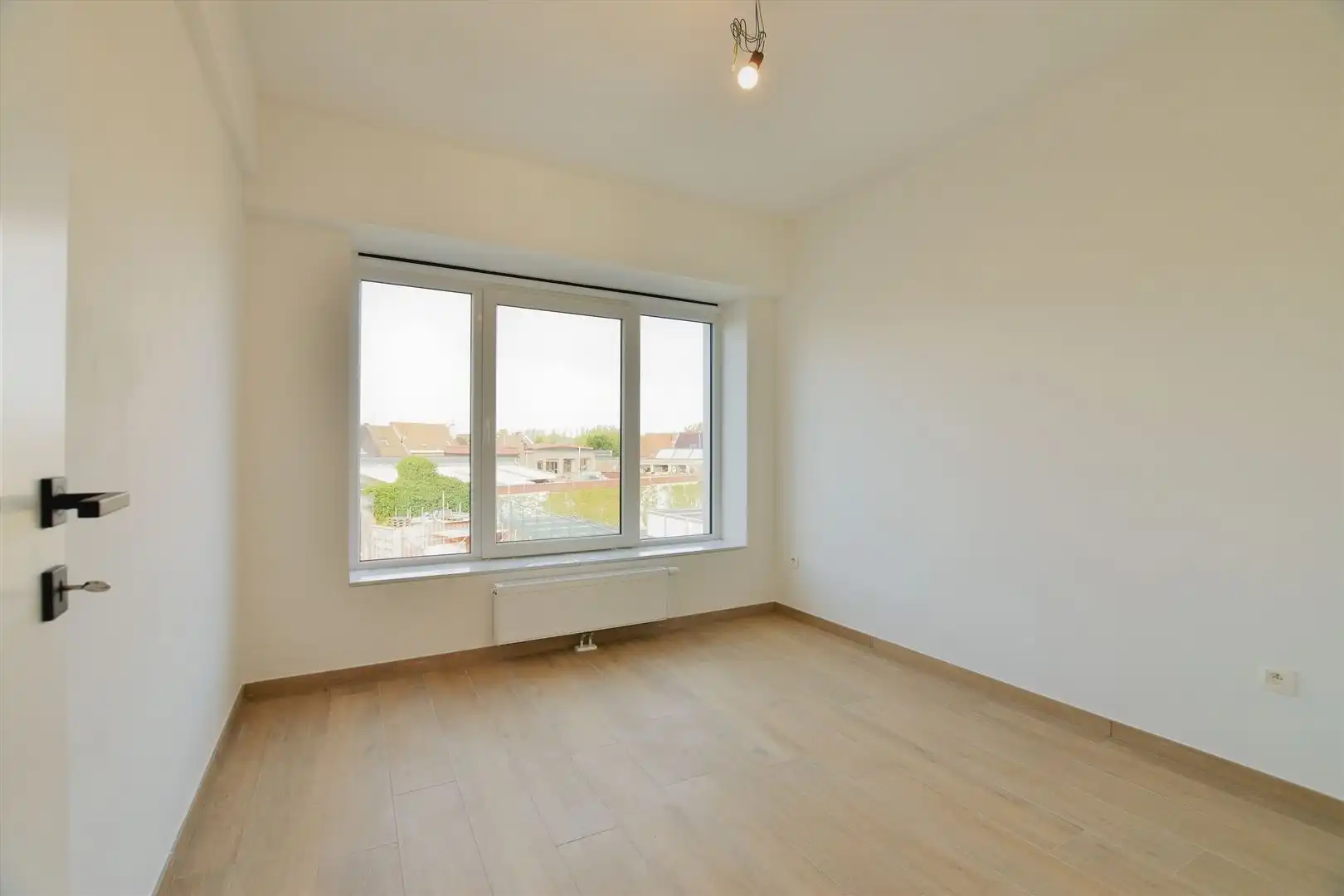 Prachtig dakappartement met terras, gelegen in het hartje van Sint-Gillis-Dendermonde. foto 14