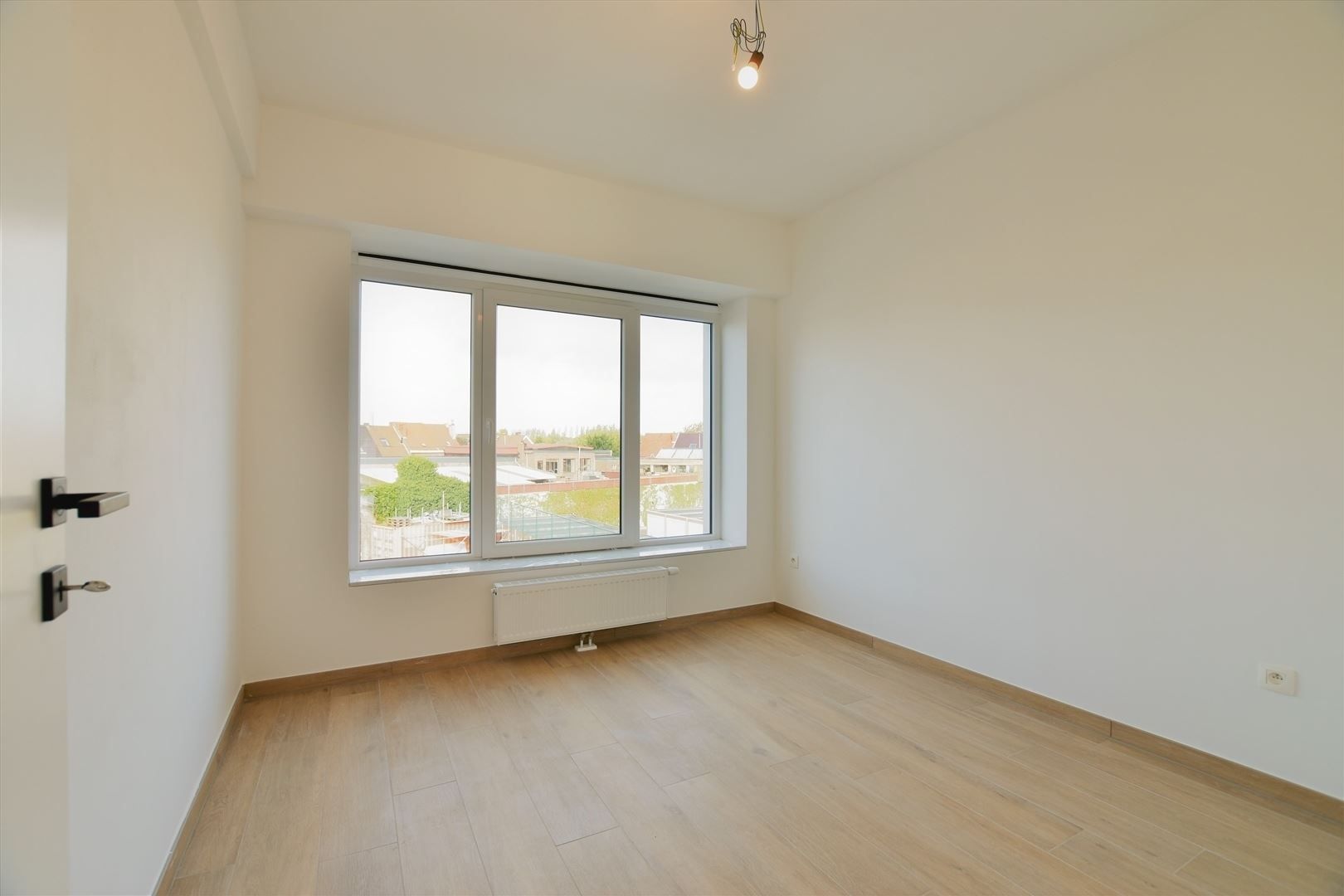 Prachtig dakappartement met terras, gelegen in het hartje van Sint-Gillis-Dendermonde. foto 14