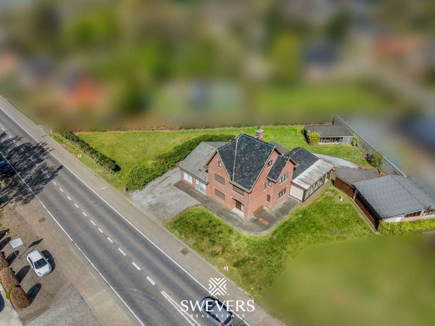 Bouwgrond met potentieel voor villa, totaalrenovatie of verkaveling te Zonhoven foto {{pictureIndex}}