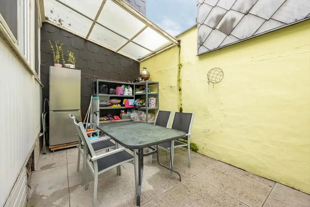 Gezellige woning met ruime garage en stadskoer foto 7