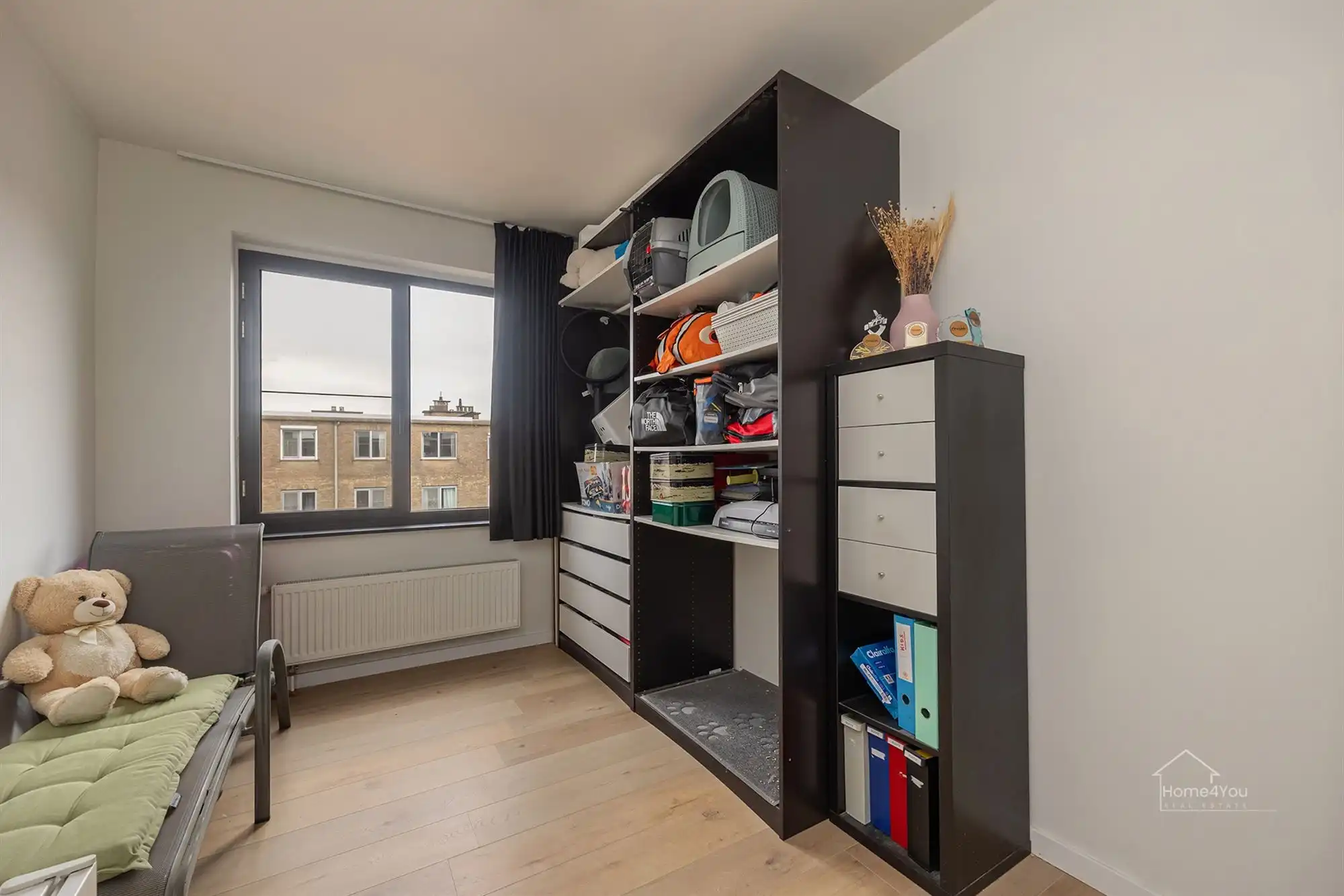 Ruim en lichtrijk appartement met terras + autostaanplaats foto 16