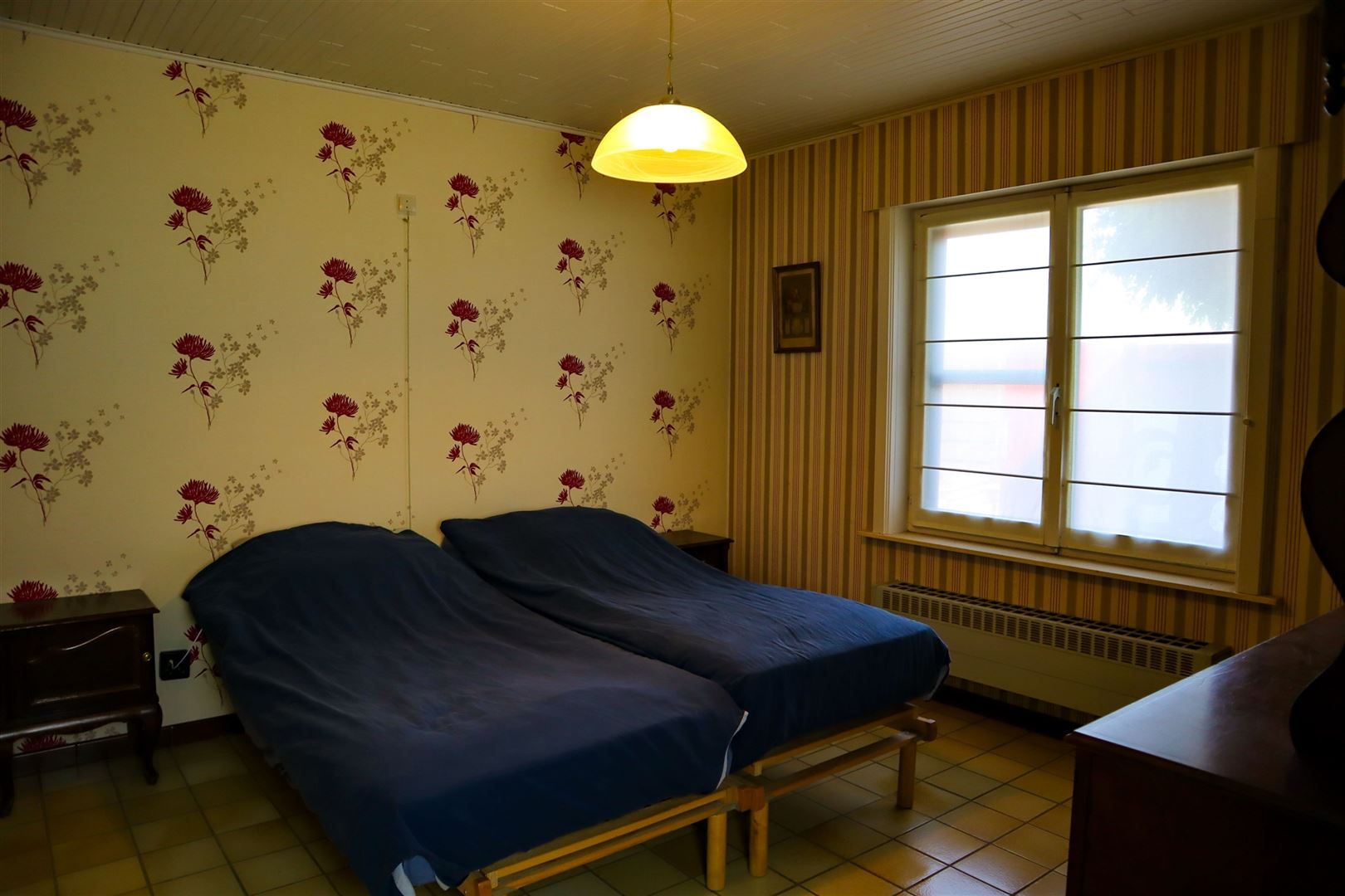 Open bebouwing op 1000m² te Ename foto 12