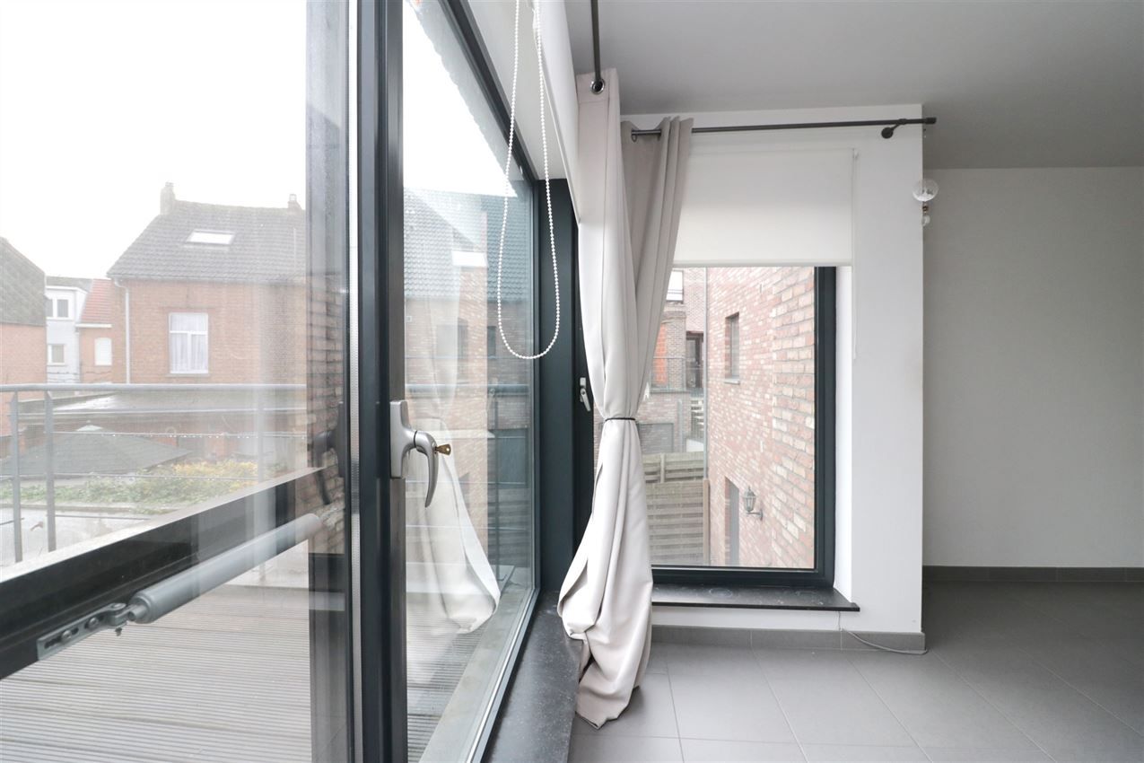 Duplex-appartement met 2 slpk., terras, autostaanplaats in centrum foto 29