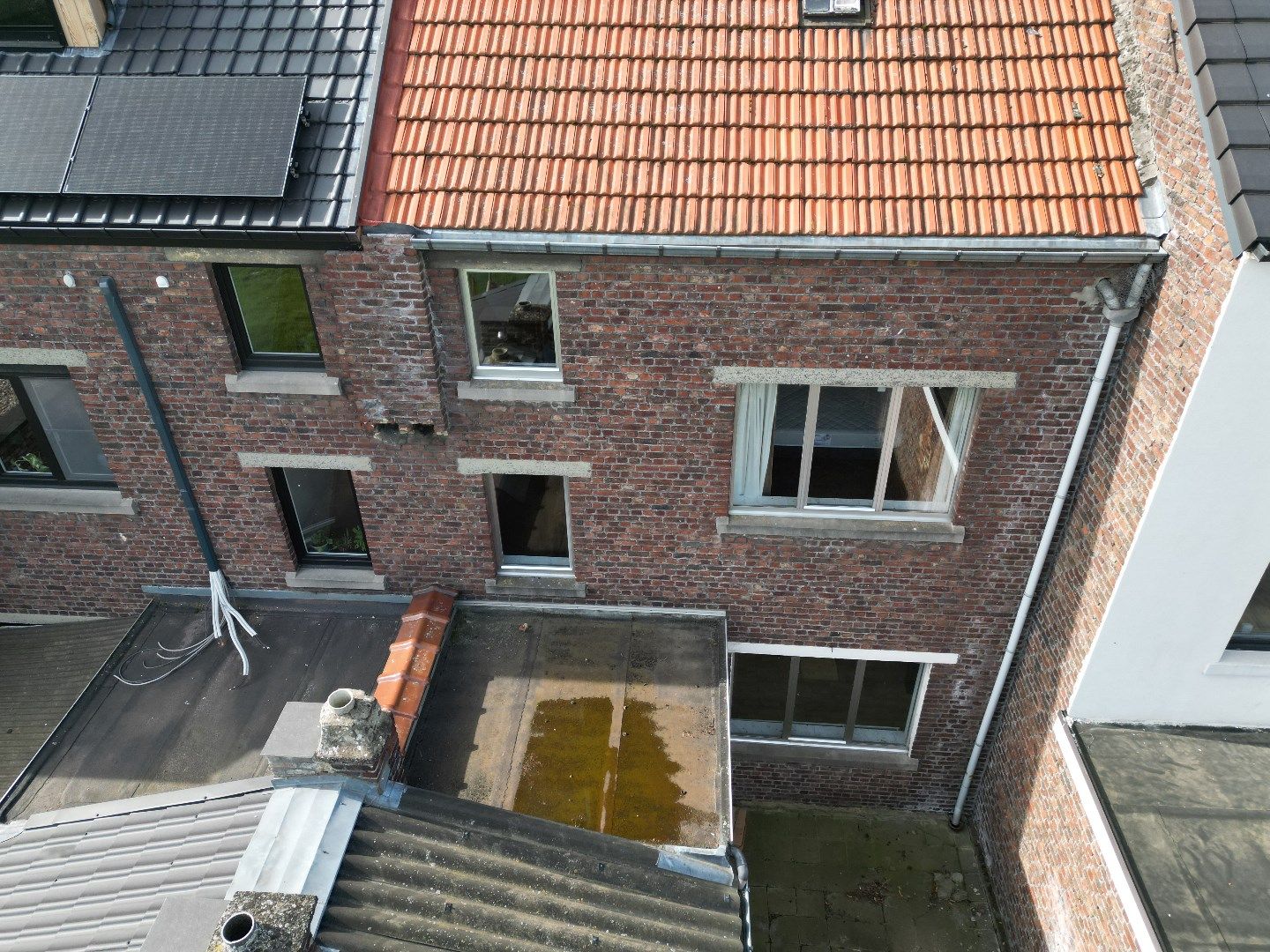 Gezellige rijwoning met grote tuin en boomgaard op stadsrand foto 22