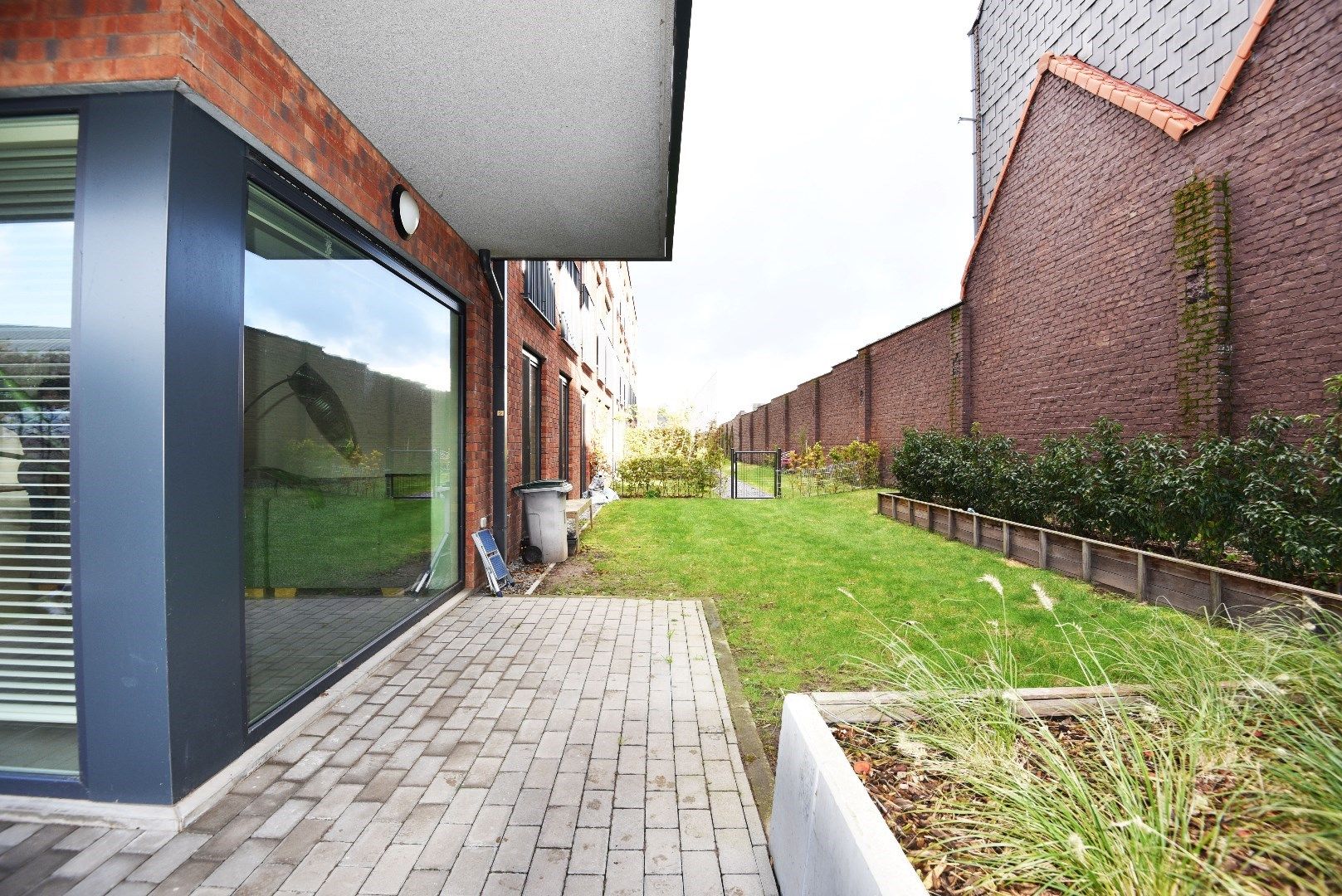 Gelijkvloers appartement met 2 slaapkamers en zonnige tuin te Maldegem centrum. foto 9