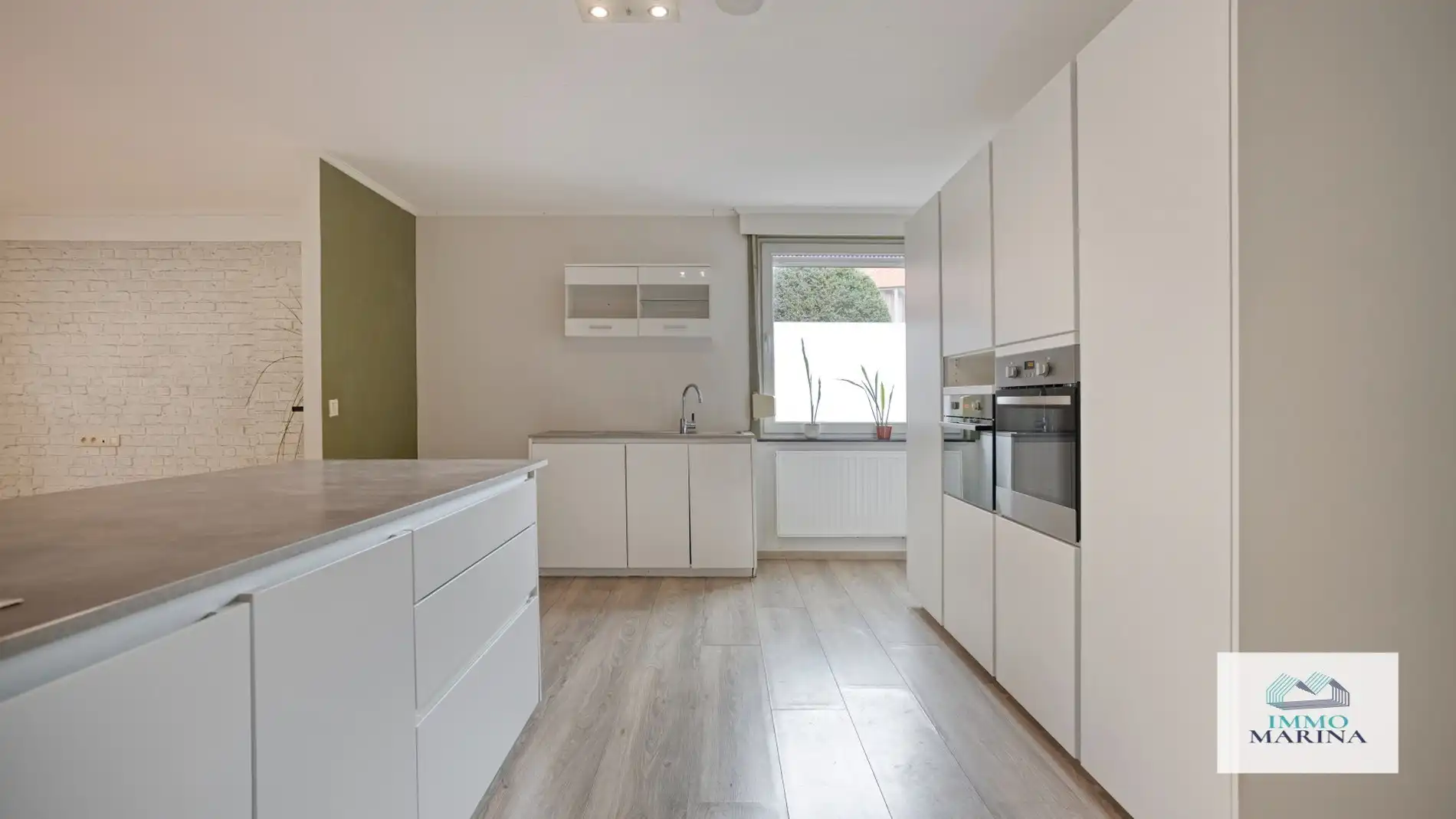 Ruim gelijkvl app met 2 slpks en tuin, centrum Tremelo foto 4
