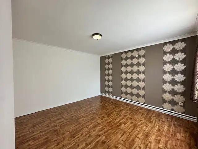 Halfopen woning met 3 slaapkamers, tuin en garage te Neeroeteren.  foto 11