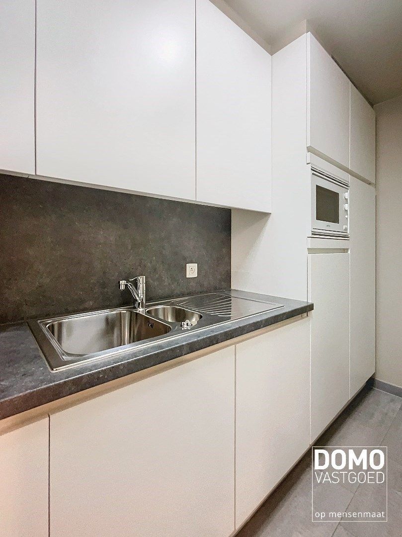 KANTOOR/PRAKTIJKRUIMTE TE HUUR IN CENTRUM KERMT MET ONDERGRONDSE AUTOSTANDPLAATS foto 11