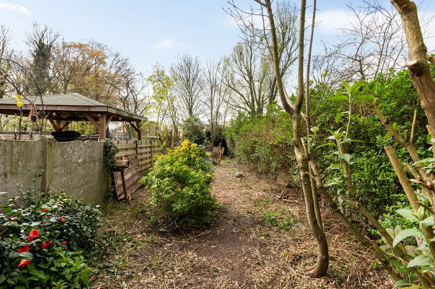 Deels te renoveren rijwoning met 3 slaapkamers, tuin en veel potentieel in Merksem! foto 10
