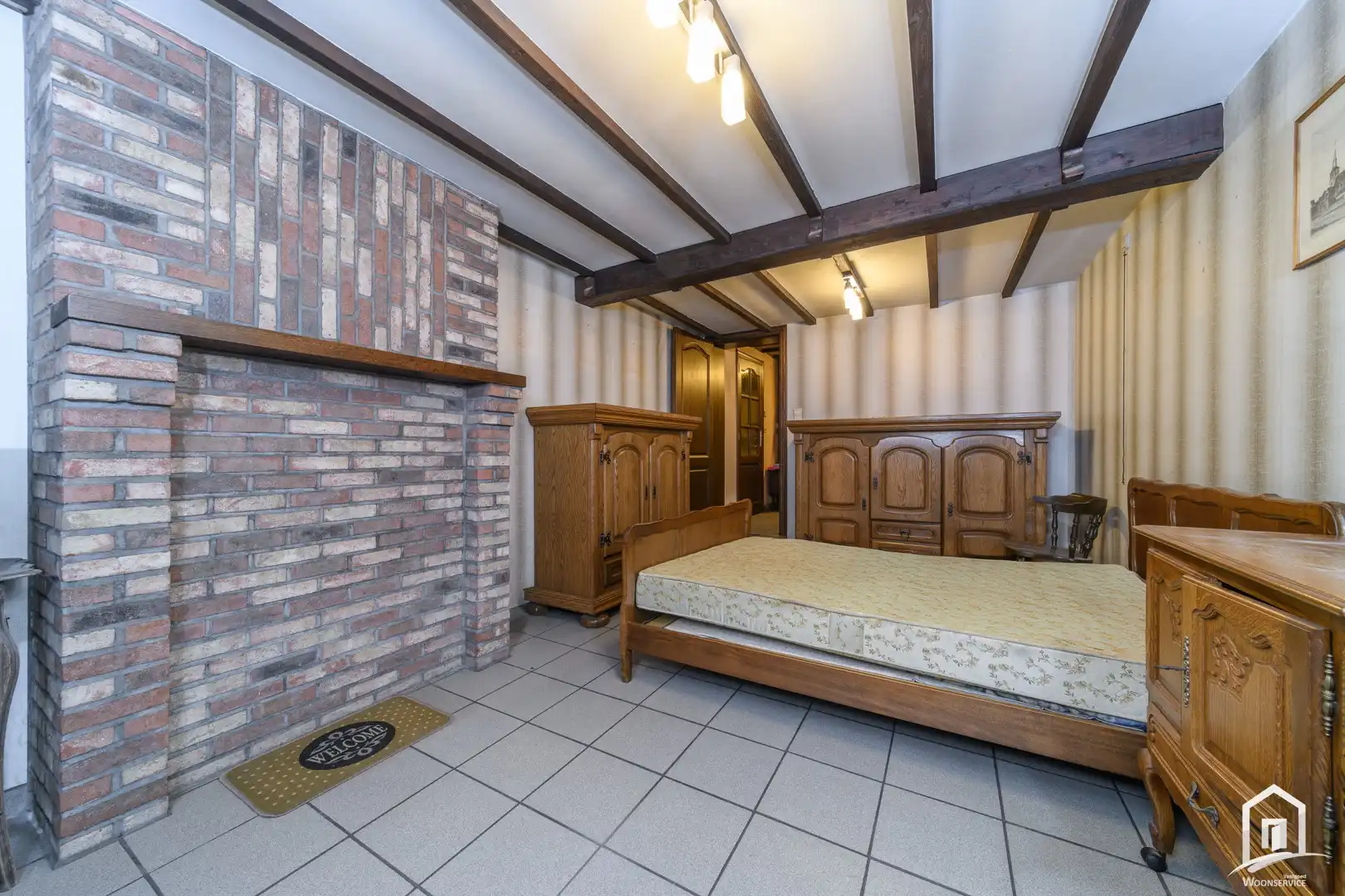 Te renoveren gezinswoning met zeer ruime tuin! foto 8