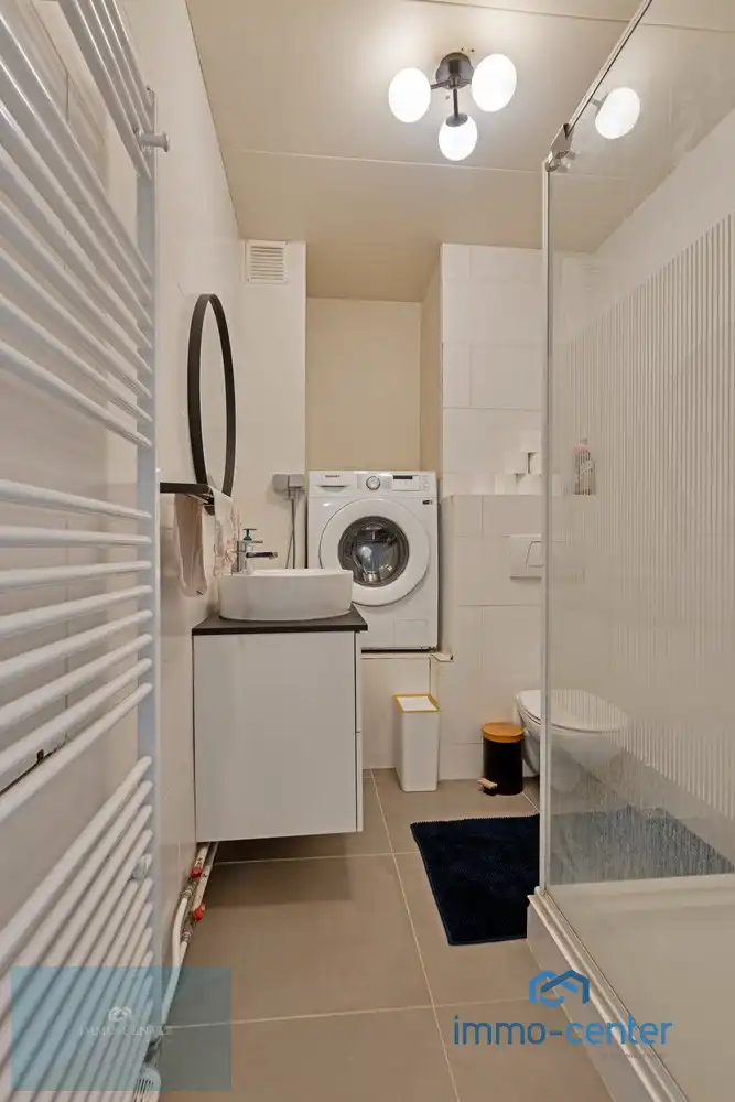 Instapklaar 2-slaapkamer appartement met vernieuwde keuken en badkamer in het hart van Genk foto 7