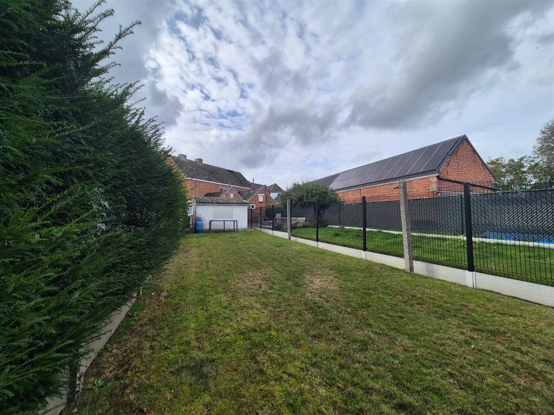 Knusse woning met tuin en garage.  foto 12