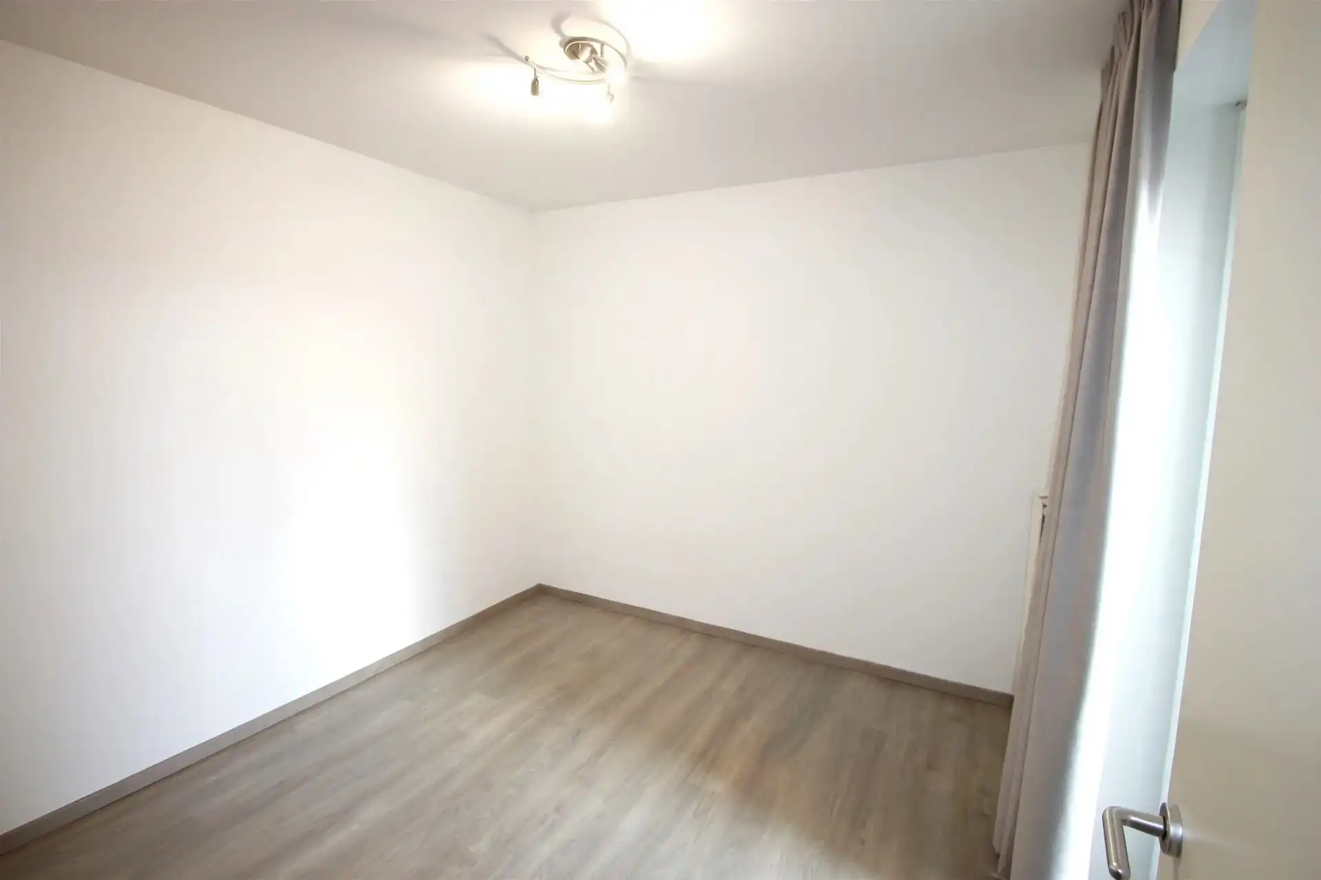 Gelijkvloersappartement met tuin en 2 slaapkamers foto 5