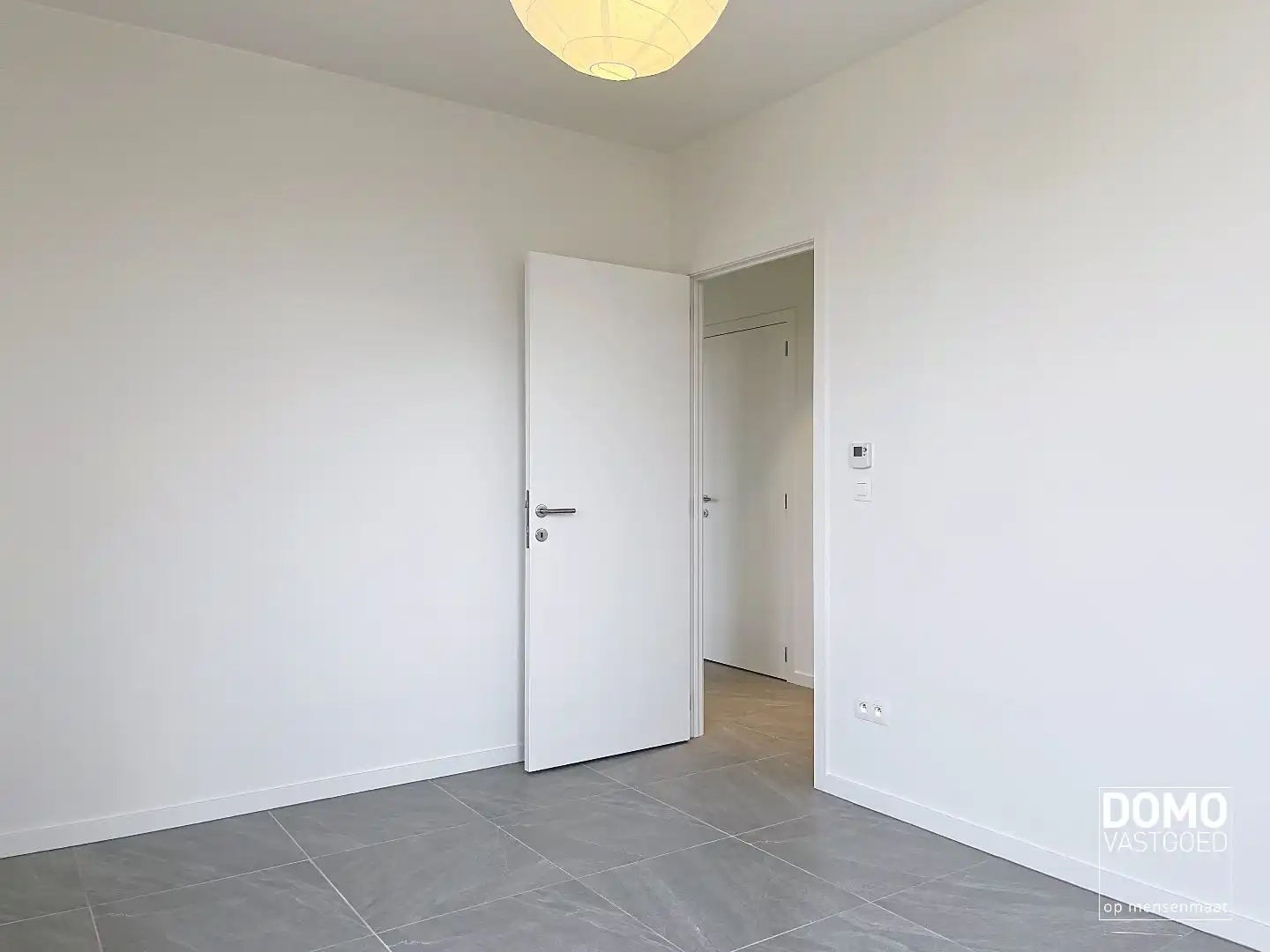 PRACHTIG APPARTEMENT MET ZONNIG TERRAS, 2 SLAAPKAMERS EN GARAGEBOX TE HUUR IN HET CENTRUM VAN HASSELT foto 11