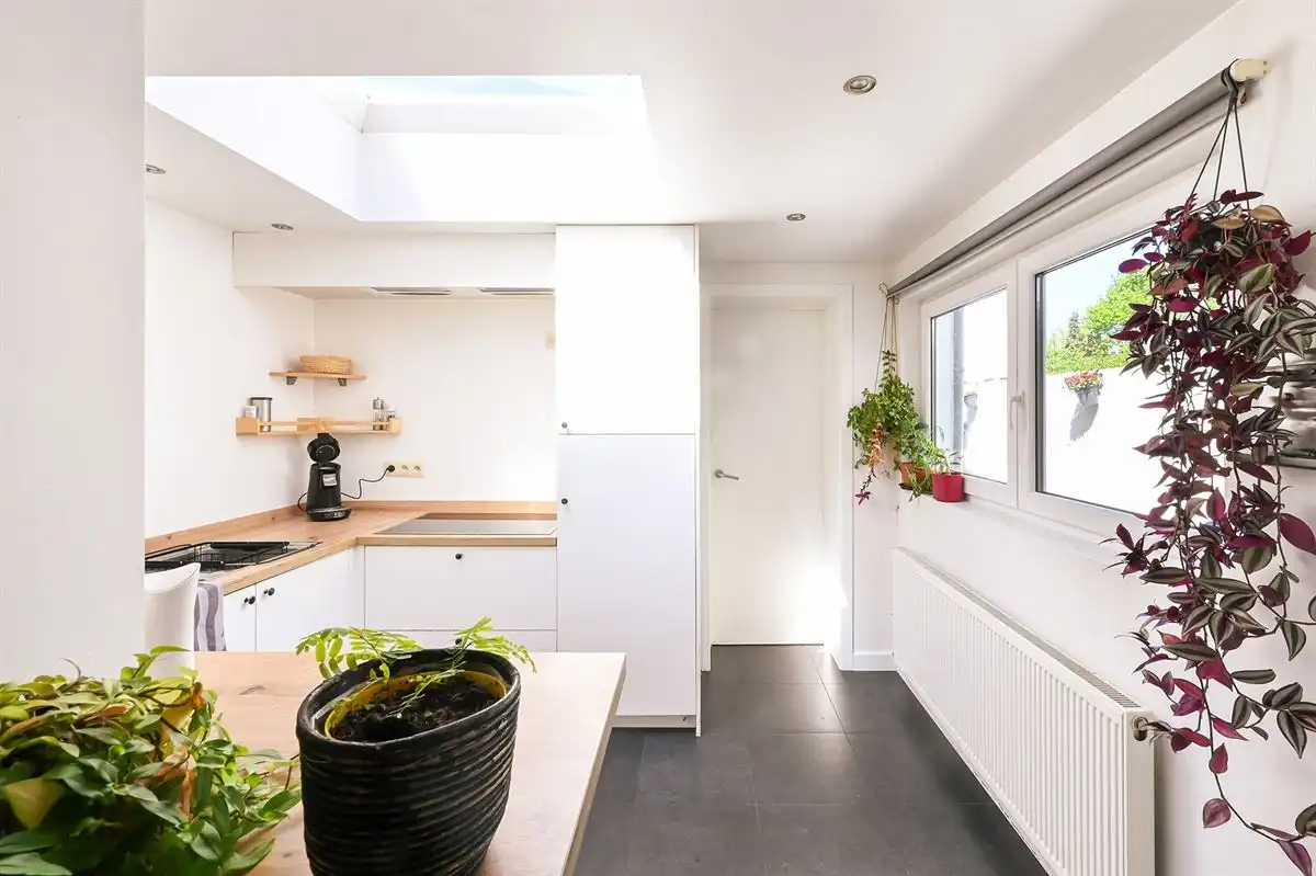 Leuke (starters)woning met zij-ingang foto 11