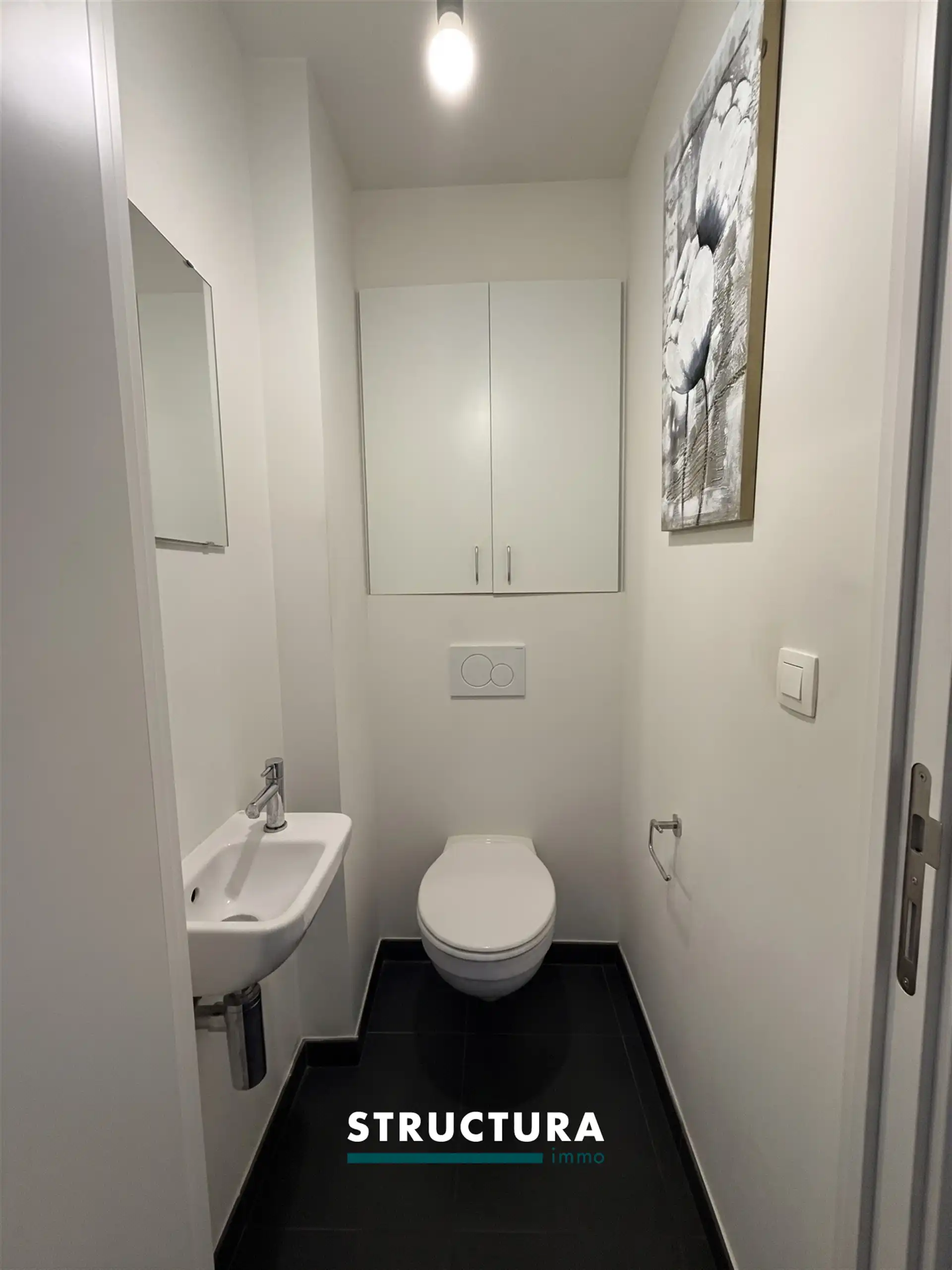 Appartement met ruim terras, staanplaats aan de Markt foto 6