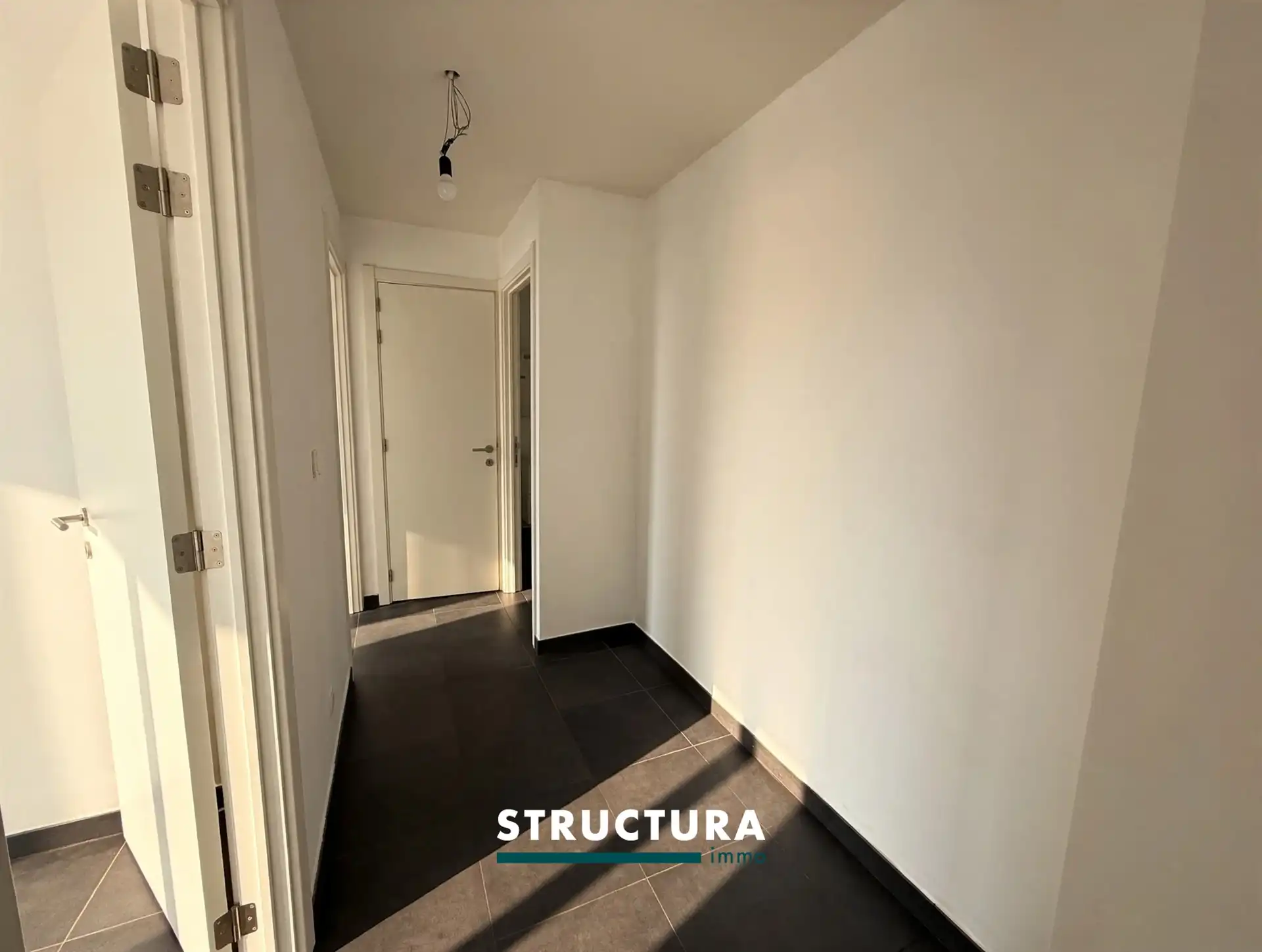 Appartement met ruim terras, staanplaats aan de Markt foto 6