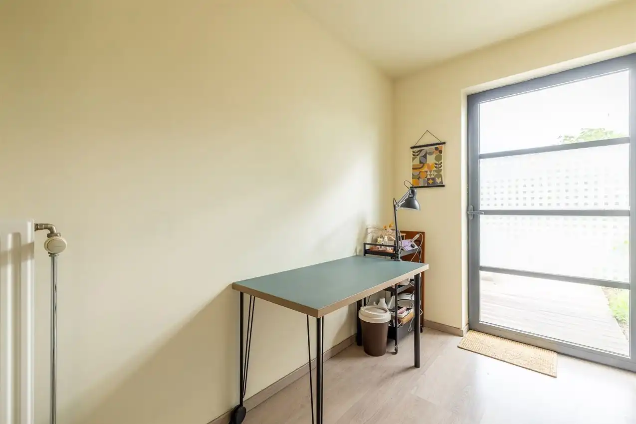 Gelijkvloers appartement met twee slaapkamers en autostaanplaats foto 16