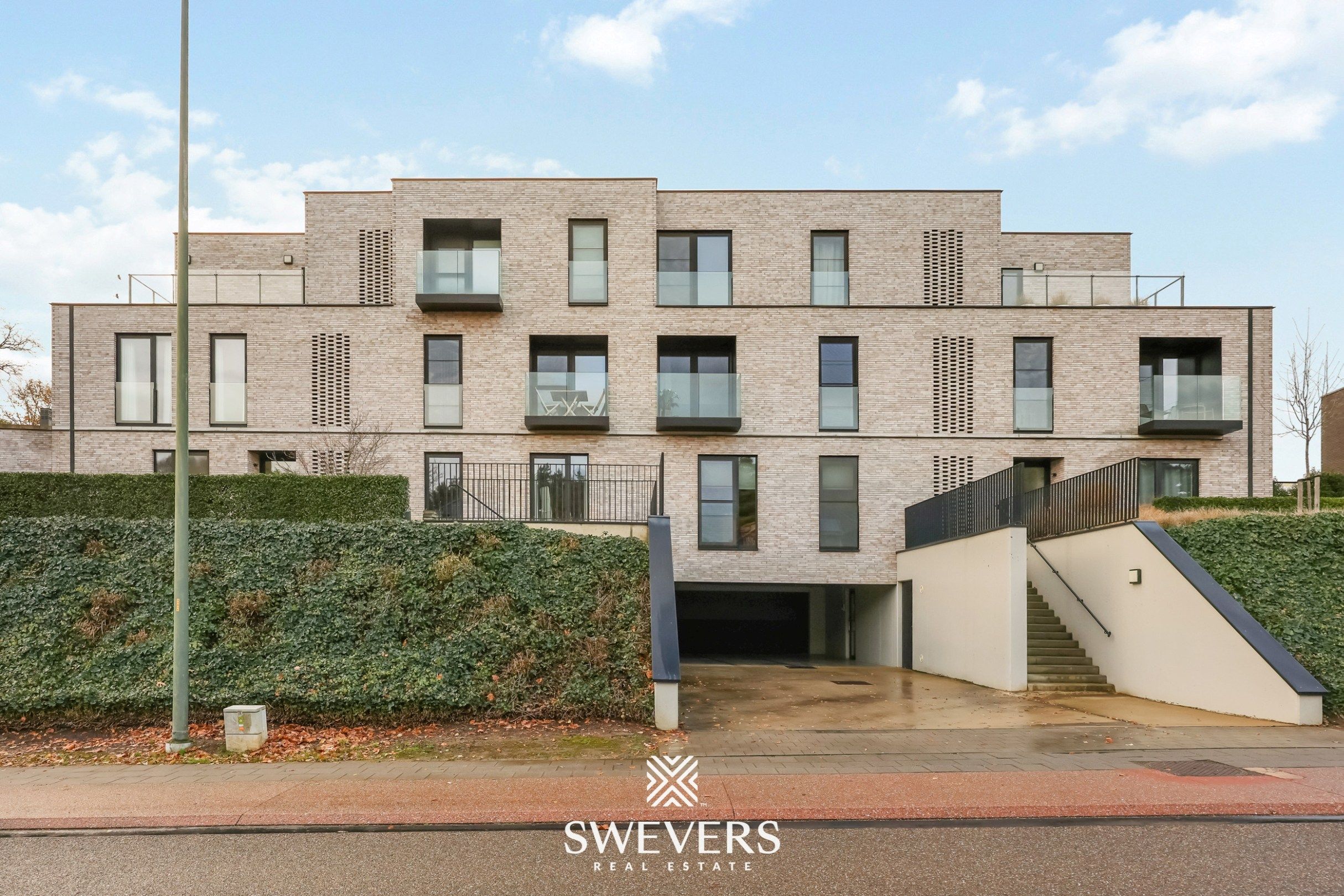 Gelijkvloers appartement met privétuin en dubbele garage foto 24