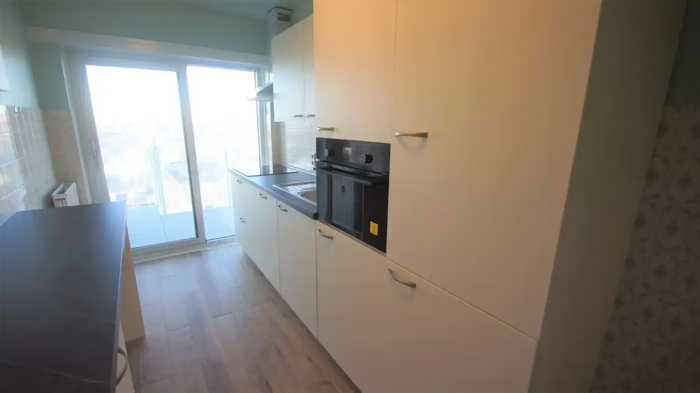 Energiezuinig en gerenoveerd app. 1 slpk en 2 terrassen foto 4