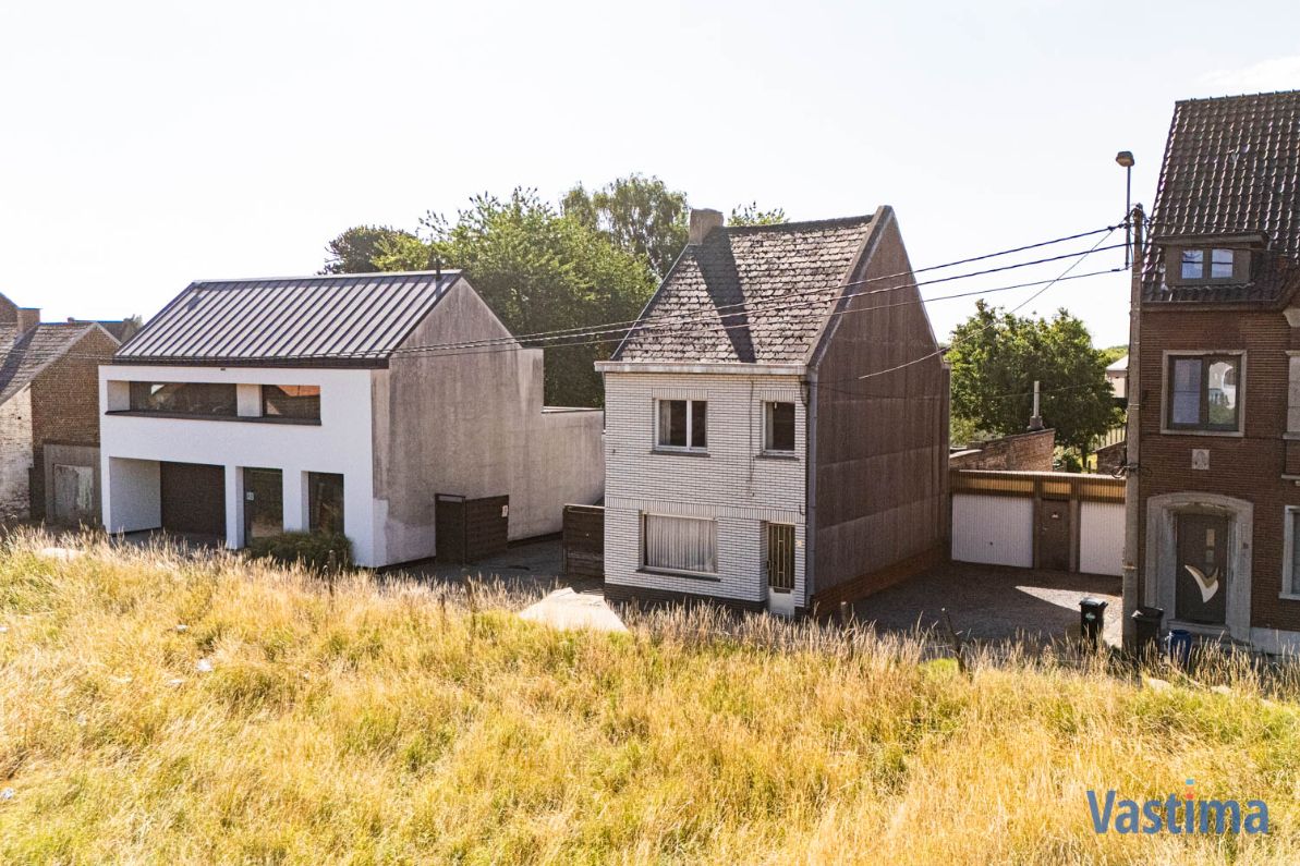 Renovatiewoning met aanpalende bouwgrond nabij centrum Erembodegem foto 3