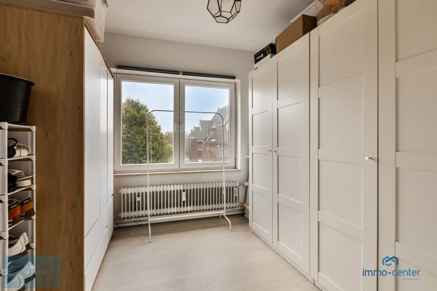 Instapklaar 2-slaapkamer appartement met vernieuwde keuken en badkamer in het hart van Genk foto 11