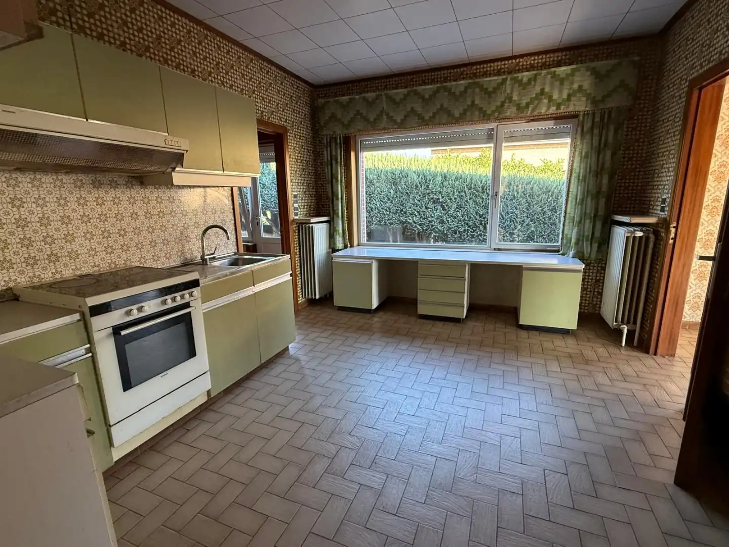 Eengezinswoning met 3 slaapkamers, garage, terras en ruime tuin foto 7
